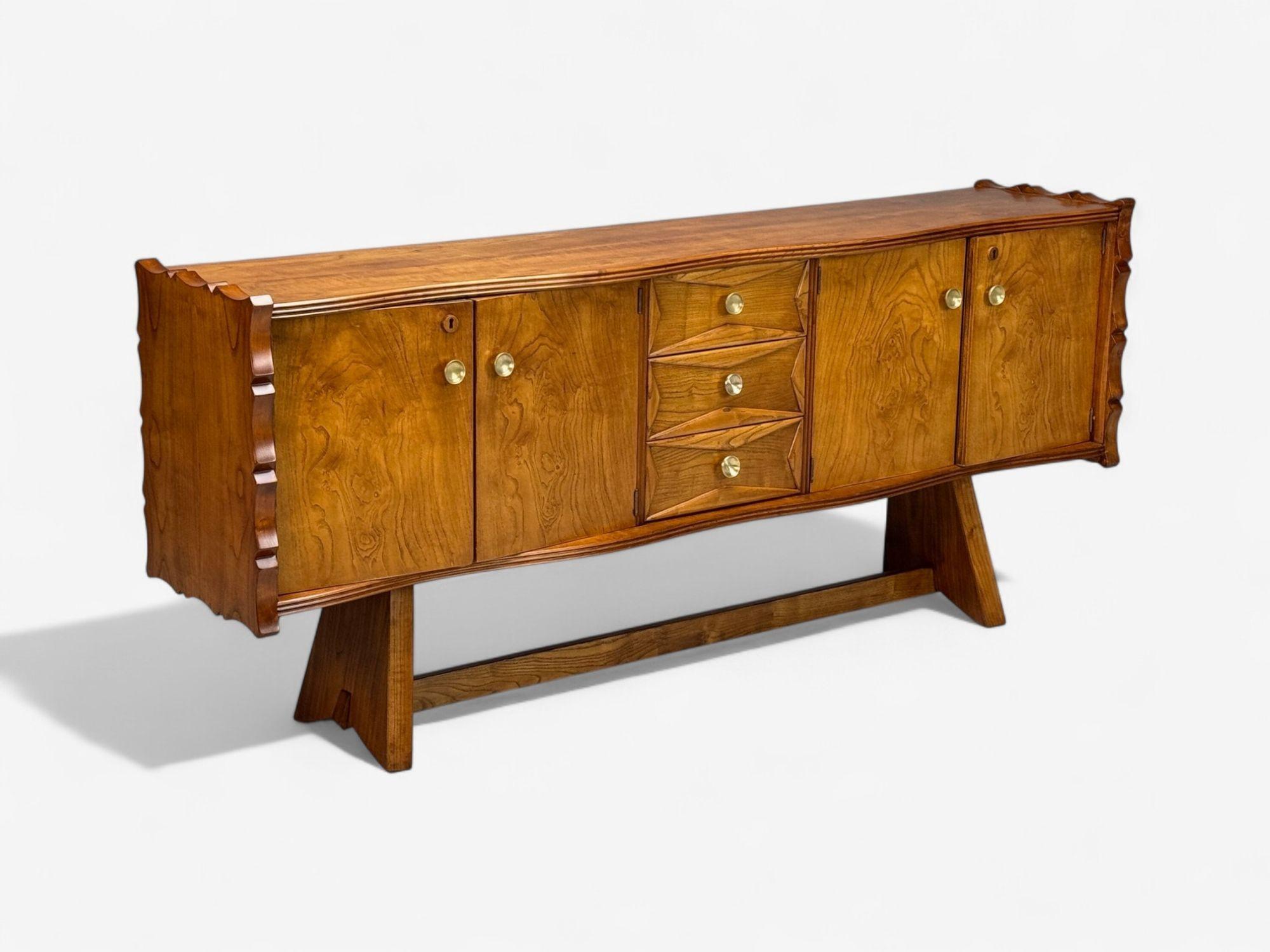 Paolo Buffa, Italian Mid-Century Modern, Cherrywood, Brass, Sideboard, Italy, 1950s

A highly sculptural and unique cherrywood and brass sideboard designed and produced by Paolo Buffa in Italy c. 1950s. This example has been fully