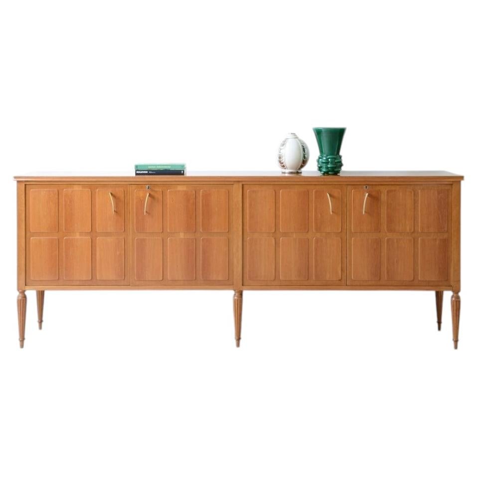 Paolo Buffa, large four-door blond oak cabinet For Sale