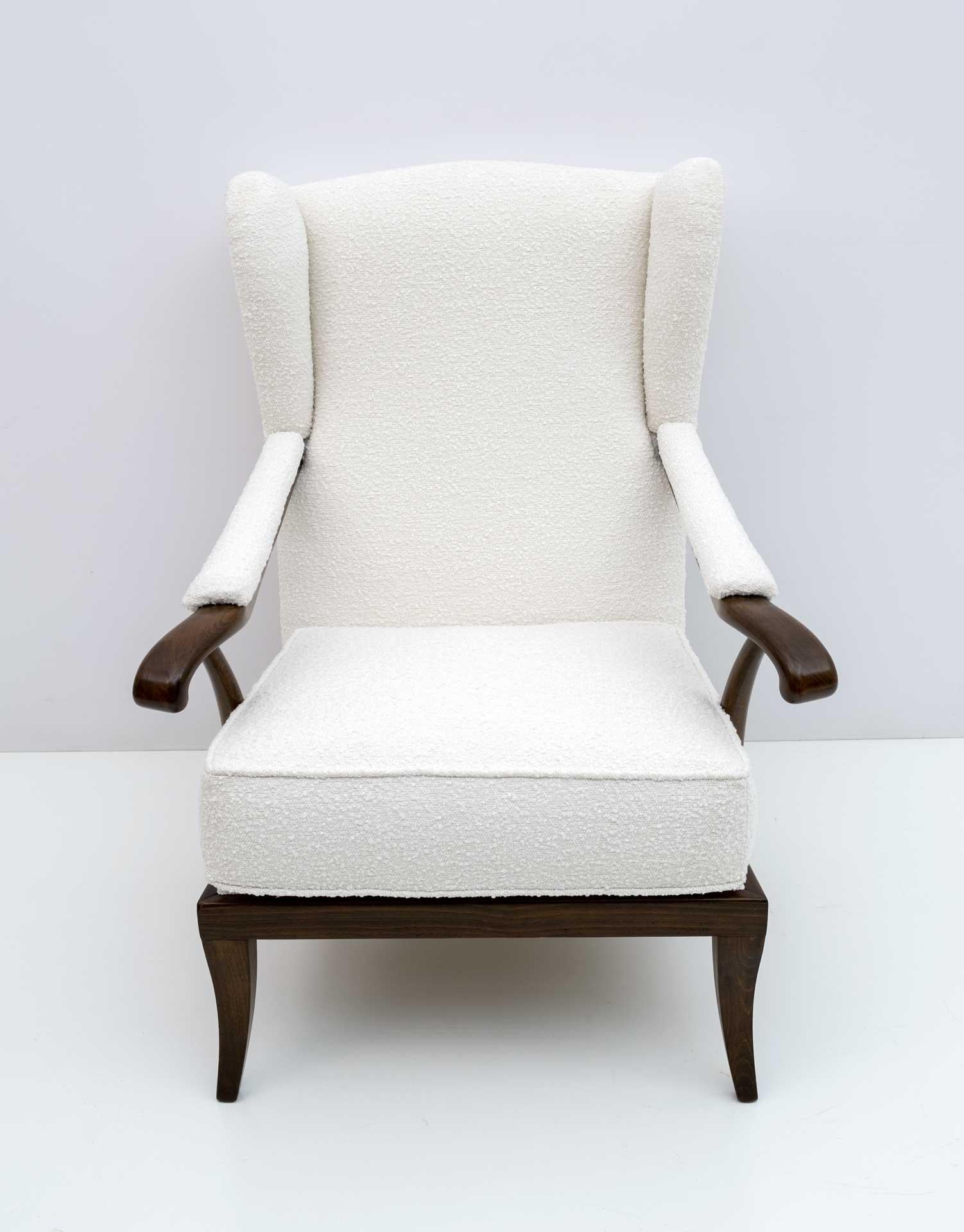 Italian mid-century armchair in light ivory Boucle fabric and walnut wood. Designed by Paolo Buffa in the 1950s. Perfect condition. Fabric and padding redone. Total restoration.