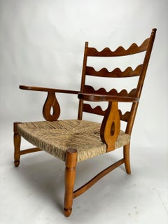 Paolo Buffa, Pair of mid-century sculptural cherrywood armchairs, Italy 1940s