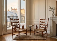 Paolo Buffa, Pair of mid-century sculptural cherrywood armchairs, Italy 1940s
