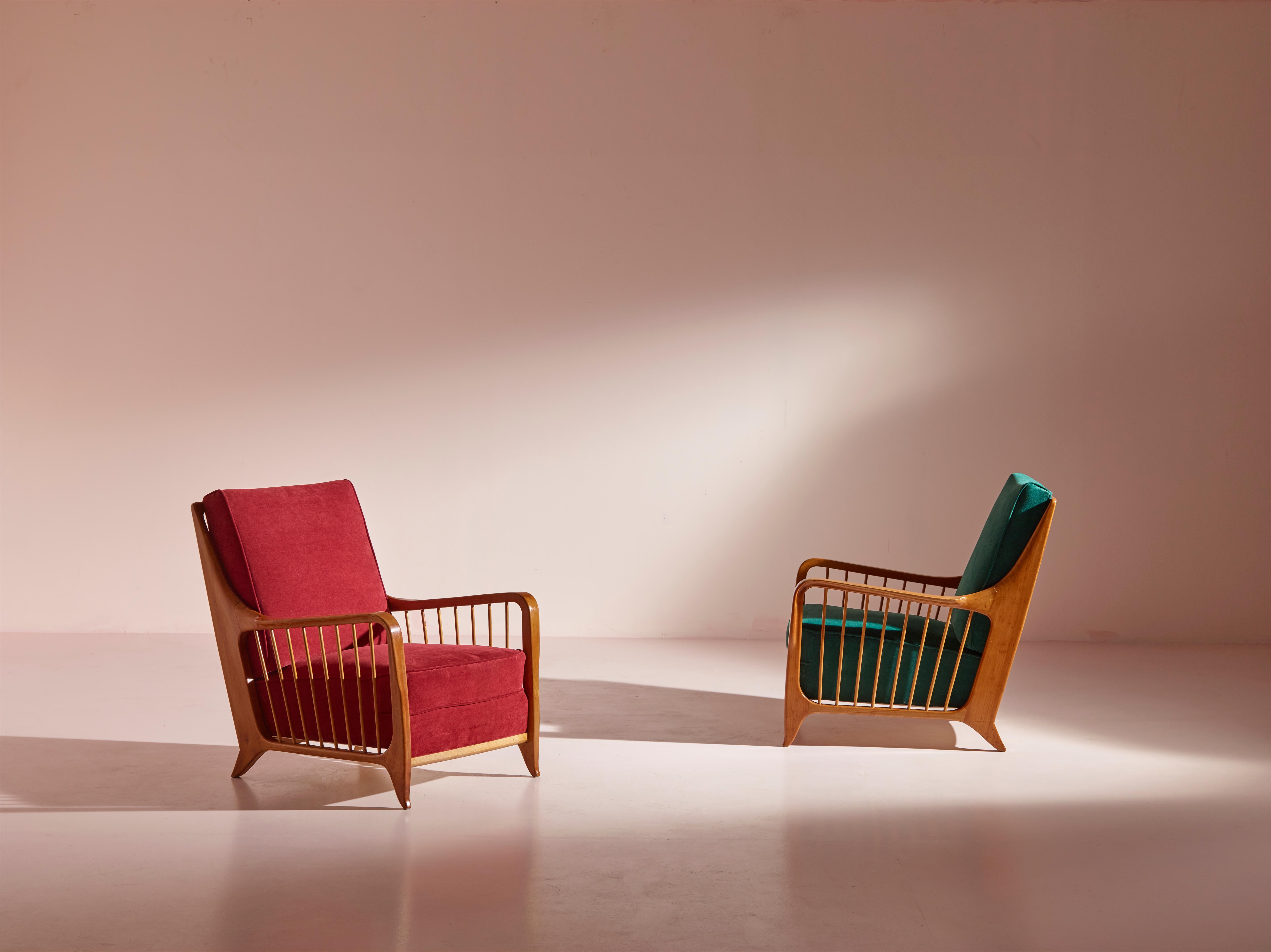 An exceptional and rare pair of armchairs, the Model 118/f by renowned Italian designer Paolo Buffa. Crafted during the 1950s in Italy, these armchairs are not just pieces of furniture; they are masterpieces of design and craftsmanship, making them
