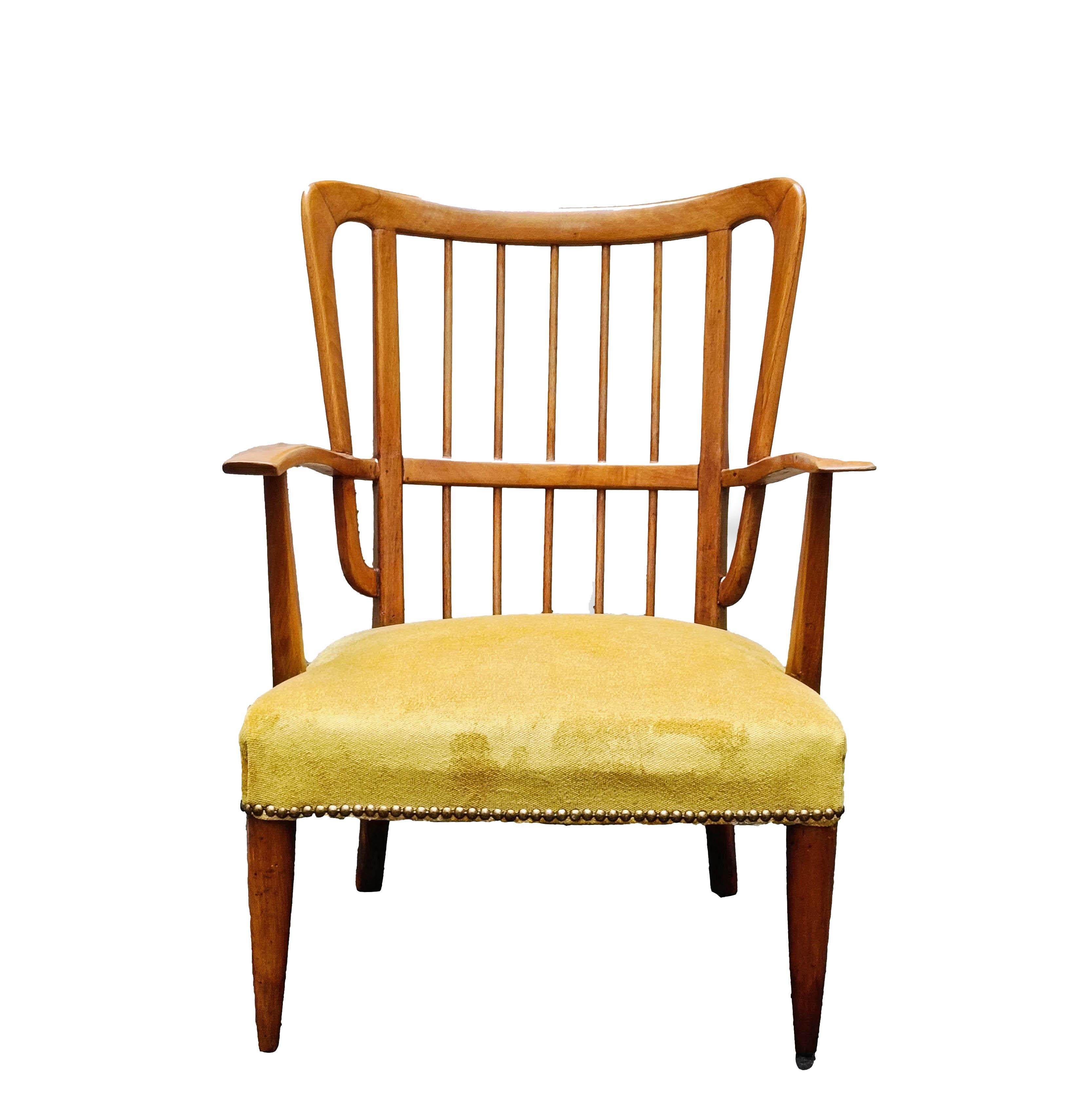 Wooden armchair with vertical rod back with armrests and wraparound back designed by Buffa Paolo (1903 - 1970)
He trained in the studio of Ponti and Lancia and opened his own studio in 1928. In the 1930s he participated in the Milan Triennials and