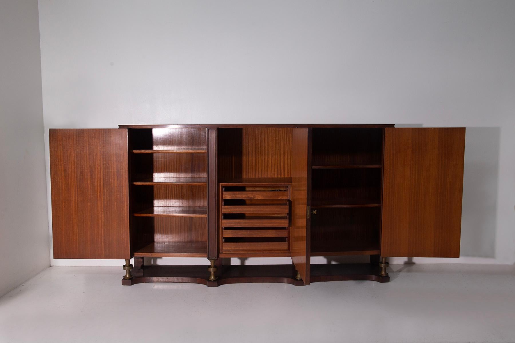 Magnificent 1950s Credenza by Paolo Buffa for Arrighi – Inlays by Giovanni Gariboldi, Signed
An extraordinary example of mid-century Italian design, this grand credenza (high buffet cabinet) was designed by Paolo Buffa and masterfully crafted by