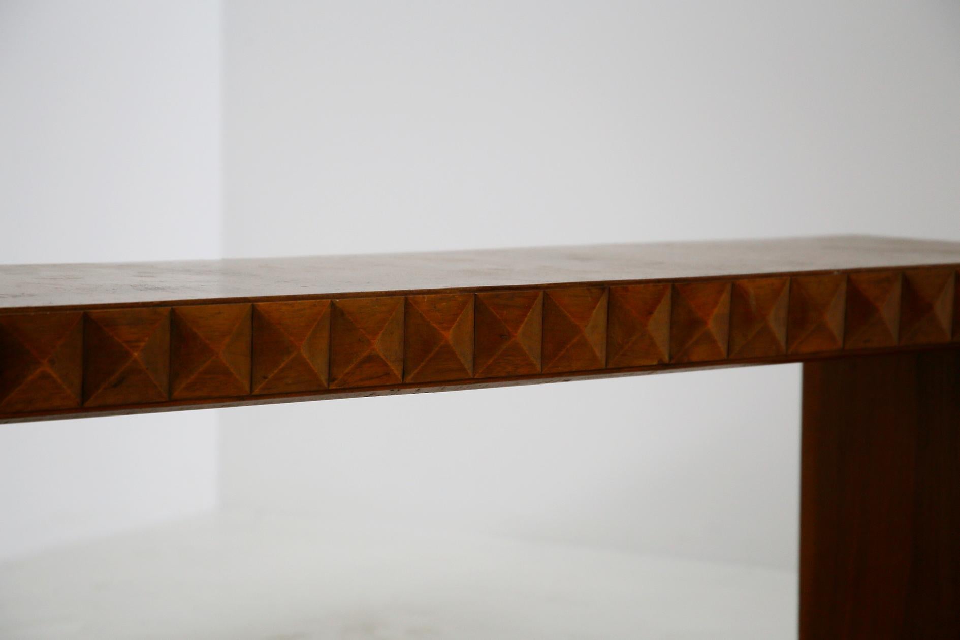 Elegant and rare bench years of 1940. The bench is designed by the great Italian designer Paolo Buffa. The bench is made in a refined rusticated technique and thanks to this manufacture the bench has an elegant and well harmonic design. The material