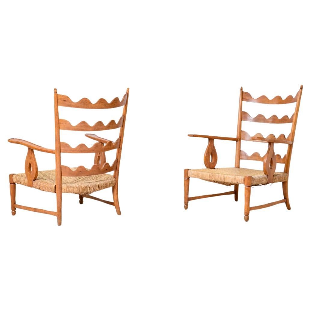 COD-2494
Paolo Buffa (1903-1970)

Rare paire de fauteuils en cerisier avec dossier en forme de vague.

Fabrication dans les années 1940.

Meubles Paolo Buffa-Roberto Rizzi

65 x 75 h 90 siège 30 cm