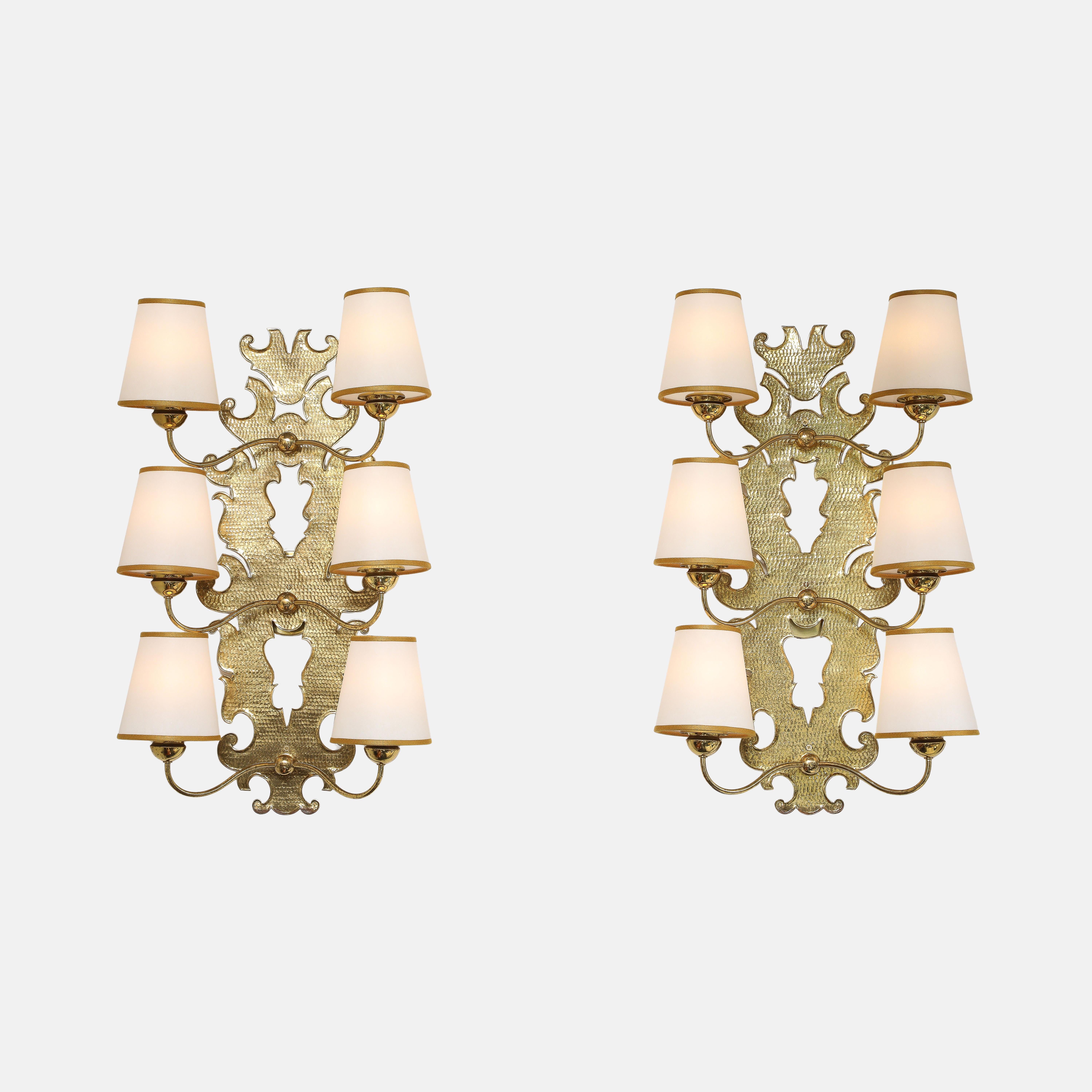 Paolo Buffa for Achille Donzelli rare and important pair of large six-arm wall lights or sconces with intricately decorative brass structures each with six lights with vellum or paper shades with gold fabric trims. These stunning wall lights have