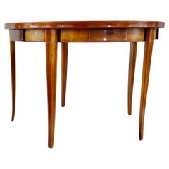 Paolo Buffa round center or game table, walnut, five hidden drawers, 1950