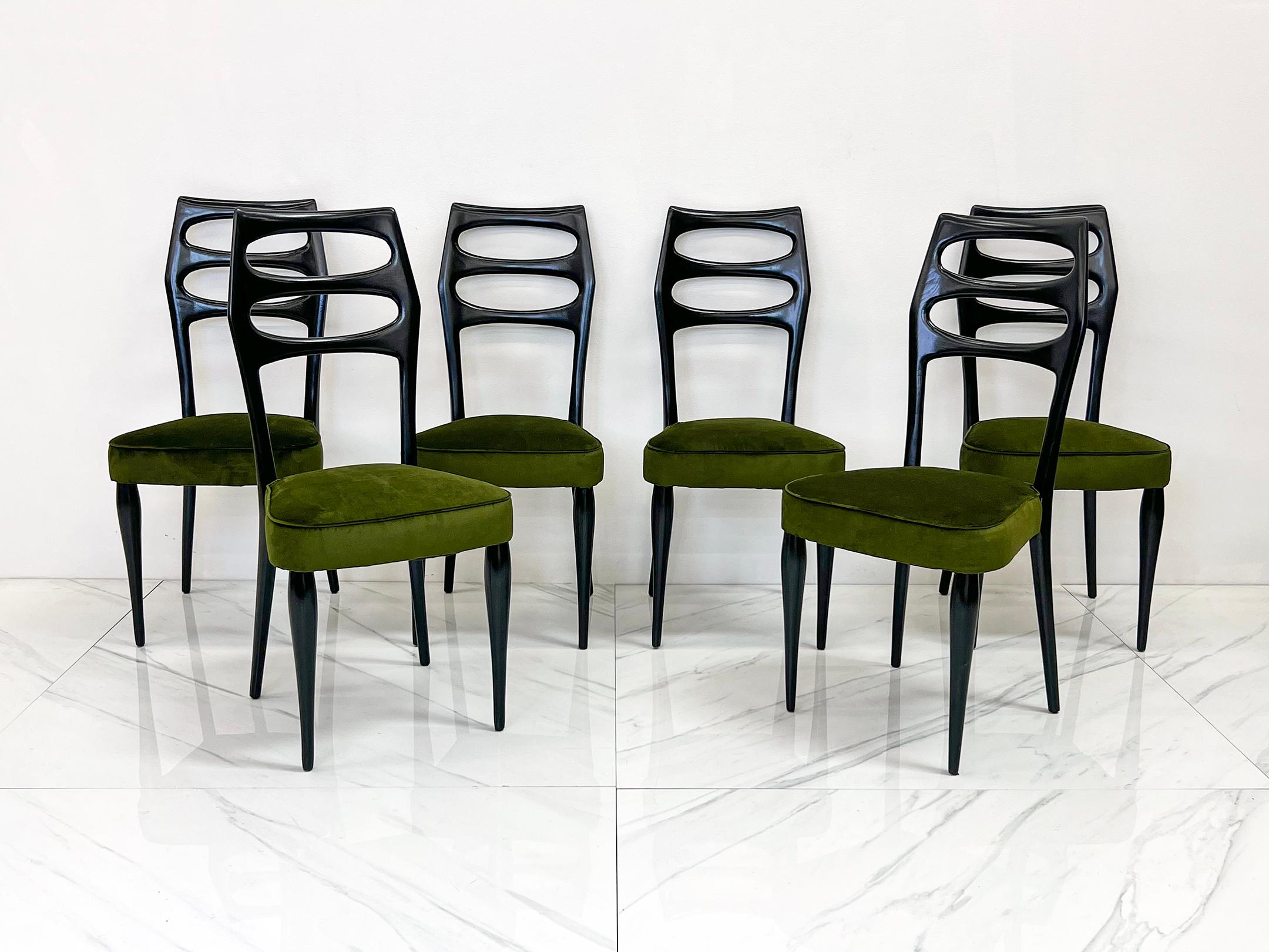 These chairs are absolutely stunning. Attributed to Italian designer and architect Paolo Buffa, this set of 6 dining chairs are sleek, refined, stylish and timelessly modern even at around 73 years old.

We've had these chairs completely