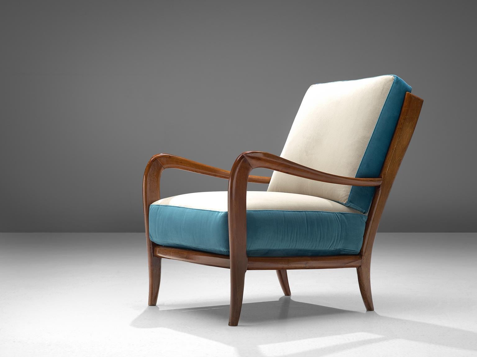 Armchair, Italian walnut and fabric, 1960s, Italy.

This poetic armchair is made in the style of Paolo Buffa (1903-1970). The chairs are luxurious in their look and feel and thanks to their slightly tilted back, extremely comfortable. The grains in