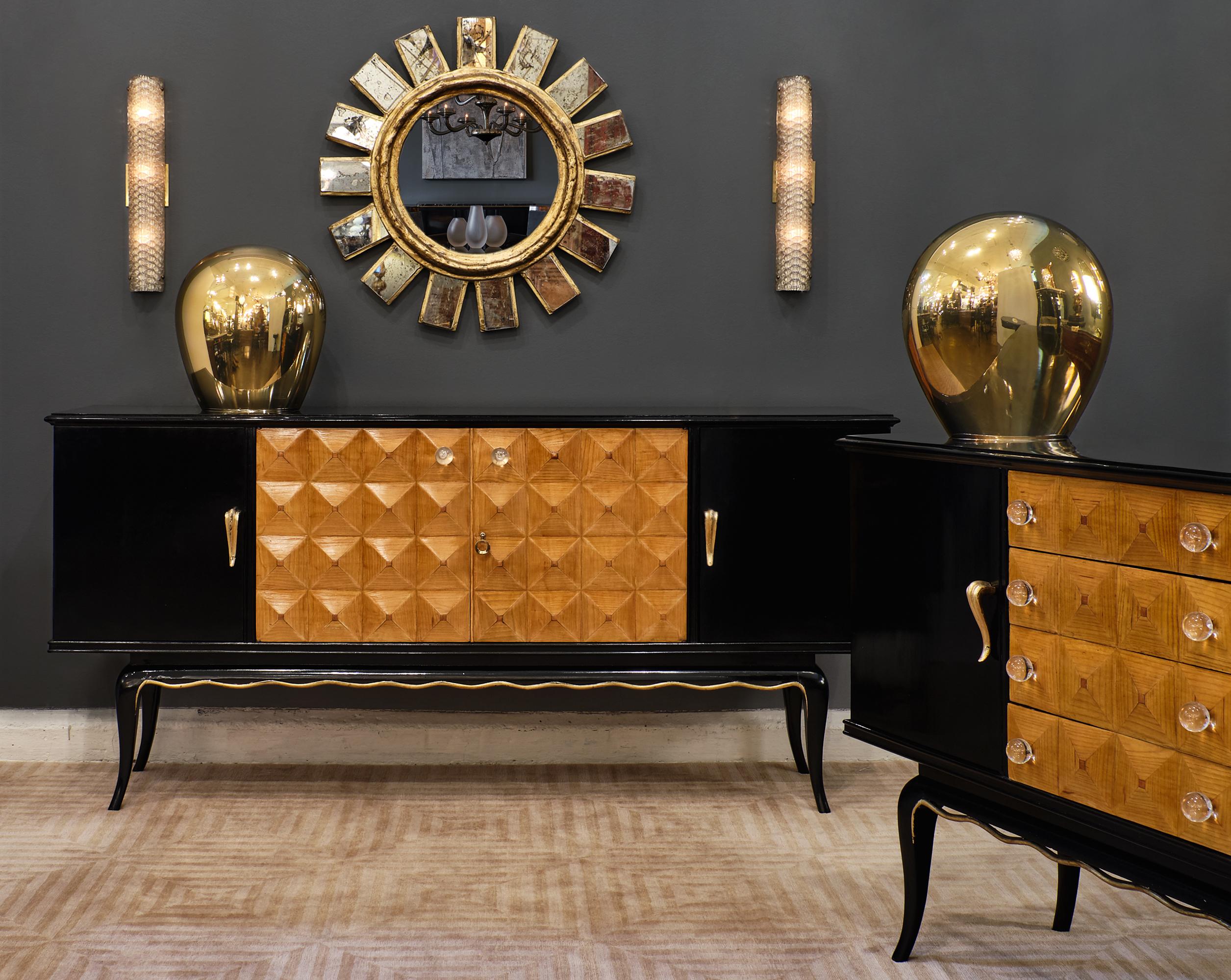 Italian midcentury Paolo Buffa style credenza with an ebonized body and drawers adorned with a beautiful ash veneer in a diamond pattern. The texture gives them such elegant visual appeal and the knobs are hand blown Murano glass. The handles on the