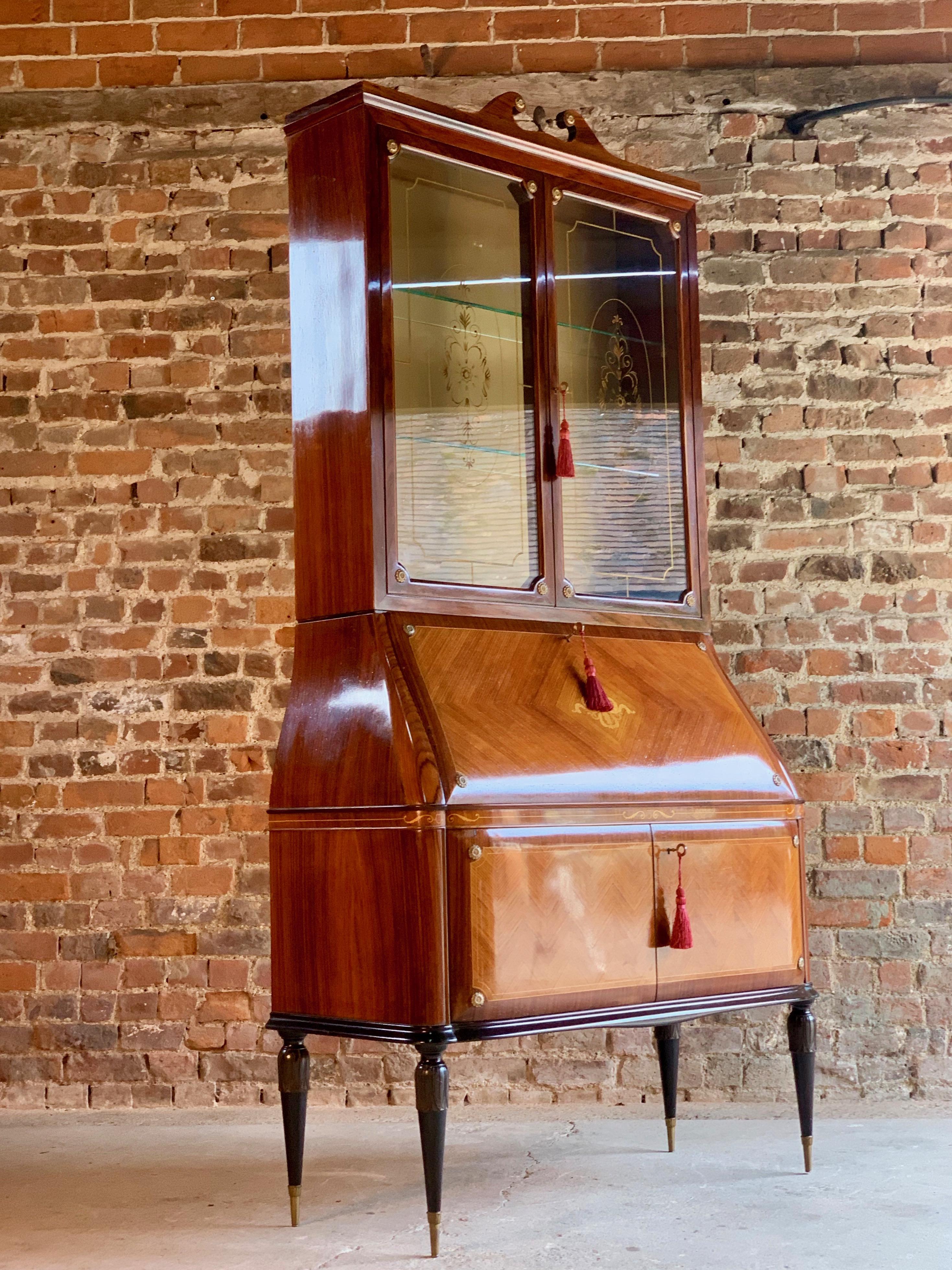 Paolo Buffa Trumeau Bureau bookcase Kingwood marquetry, Italy, circa 1940.

Paolo Buffa Kingwood, rosewood banded and marquetry inlaid tremau bureau bookcase produced by Fratelli Lietti, Italy, circa 1940, the arched broken pediment with brass