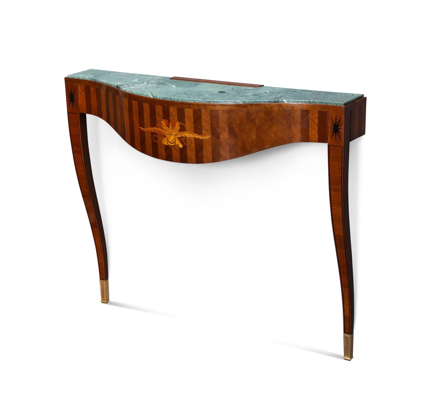 Paolo Buffa wall-mounted, bow front console table with inset marble top. Wood inlaid veneer in a classical motif apron above brass-mounted feet.  This piece has been authenticated by the Paolo Buffa Archives.