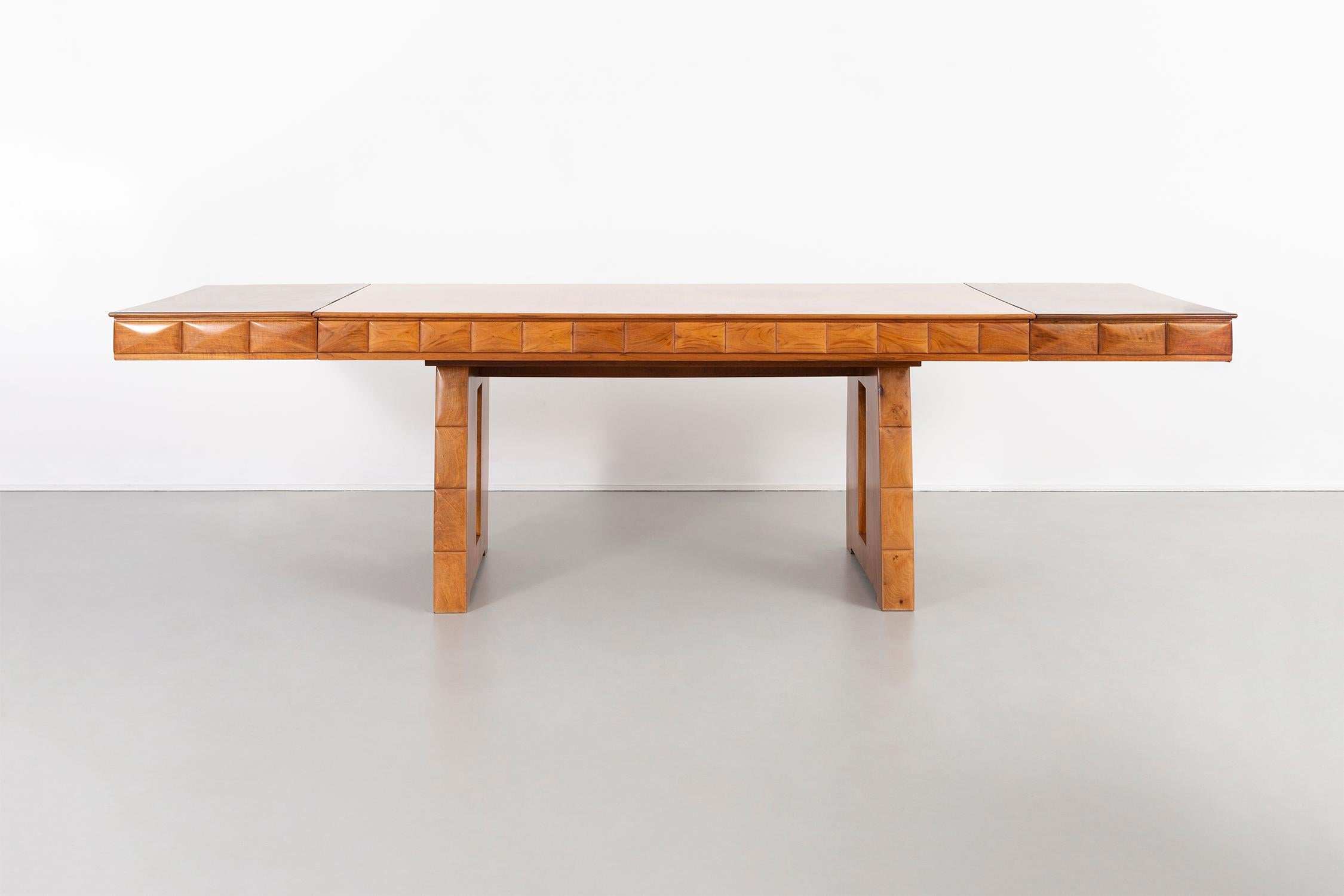 Dining table

designed by Paolo Buffa 

Italy, circa 1938

Walnut

Not extended 30 ¾” H x 70 ?” W x 35 ¼” D

Extended with two leaves 30 ¾” H x 111 ?” W x 35 ¼” D

Each leaf is 20 ?