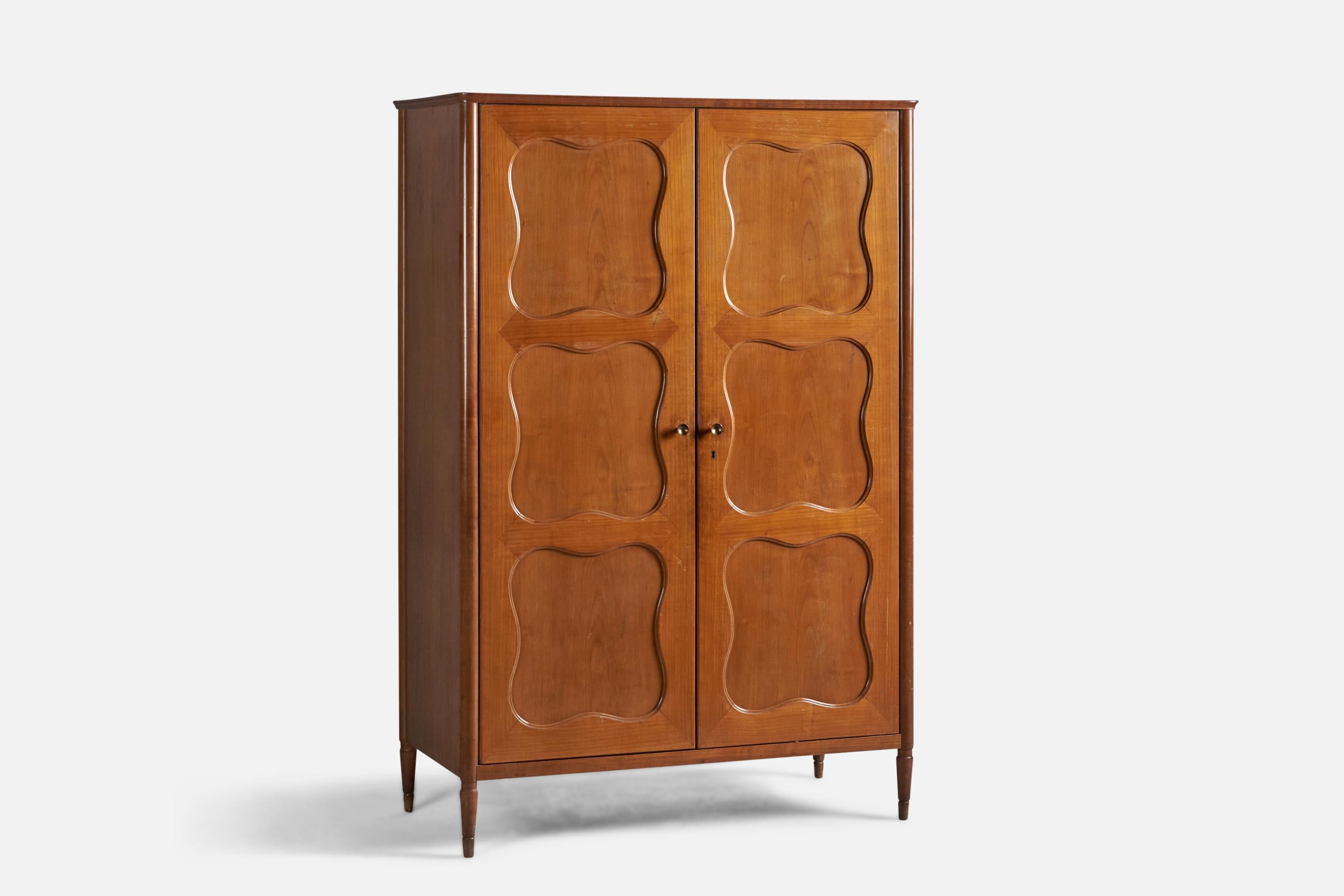 A sizeable walnut and brass wardrobe or cabinet, designed and produced by Paolo Buffa, Italy, 1940s.