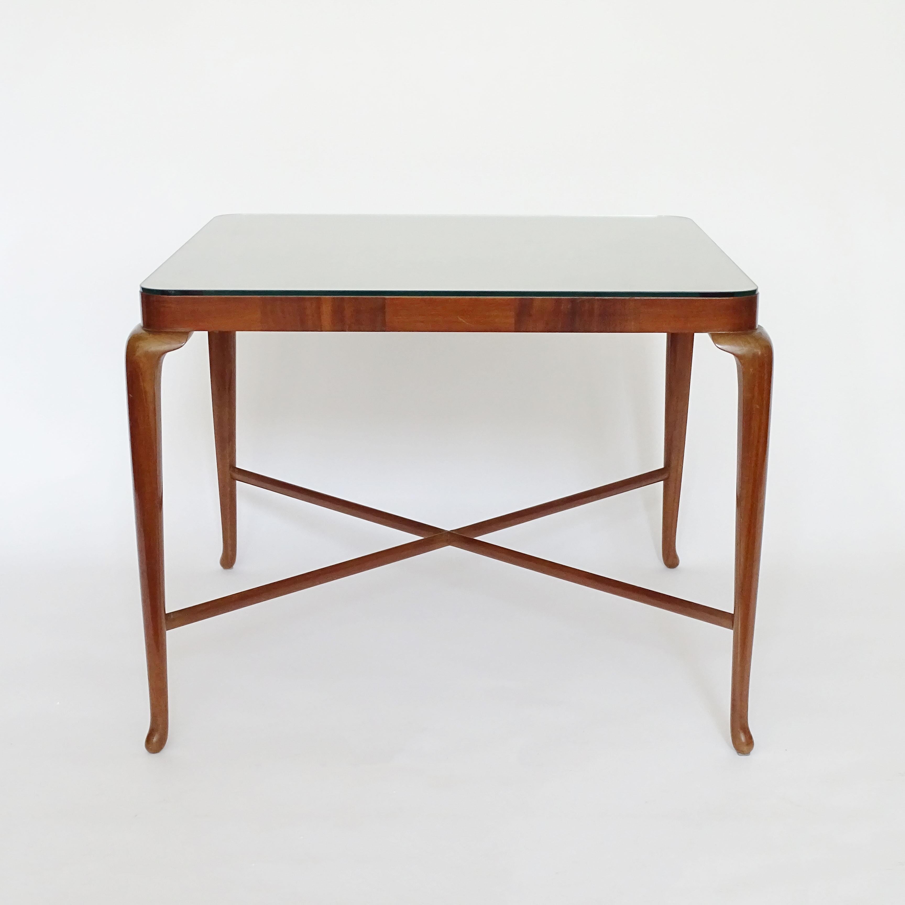 Paolo Buffa beautifully executed wooden coffee table with squares top,
Glass protective top.
Italy, 1940s.