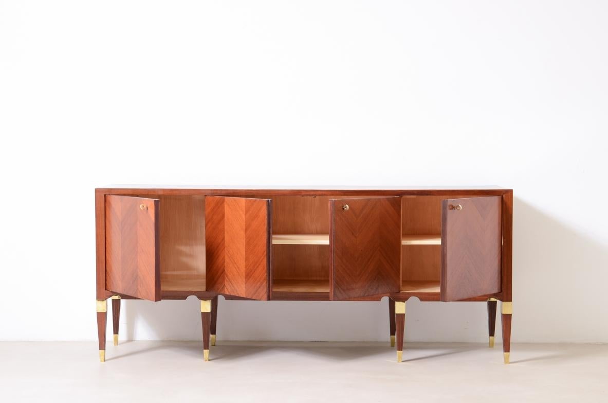 Mid-Century Modern Elegant 4-door walnut cabinet with a herringbone pattern For Sale