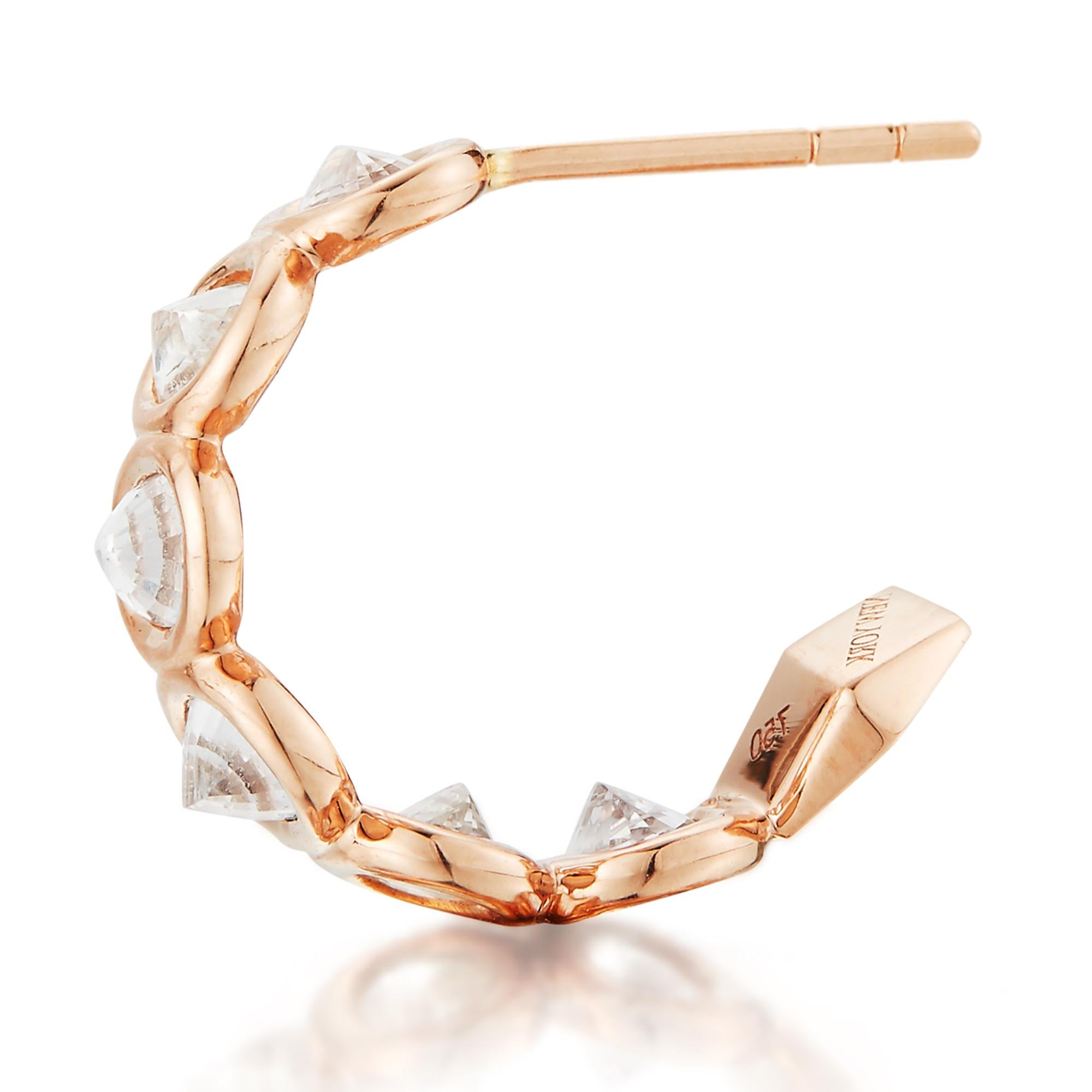 18kt rose gold Ombré hoop earrings with bezel set multishade oval white sapphires and signature Brillante® motif, petite. 

Reimagined from summers spent at the Tuscan shore, the Ombré collection highlights the diverse hues and textures found in