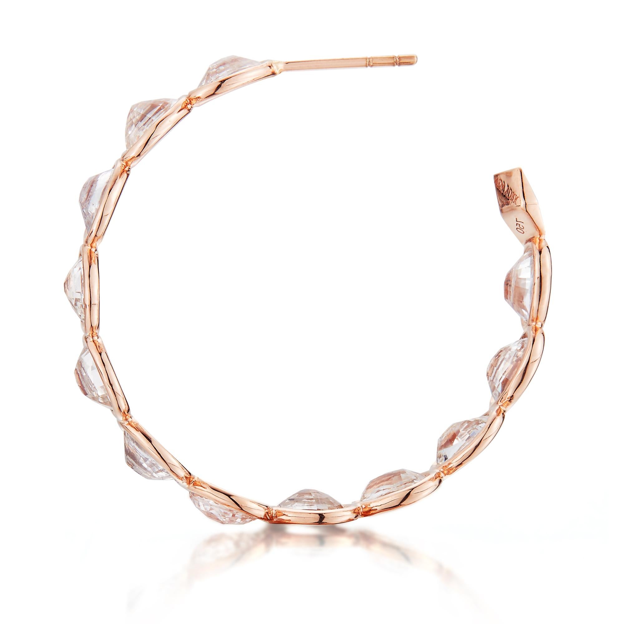 18kt rose gold Ombré hoop earrings with bezel set multishade oval white sapphires at 11 o'clock® and signature Brillante® motif, medium.

Reimagined from summers spent at the Tuscan shore, the Ombré collection highlights the diverse hues and