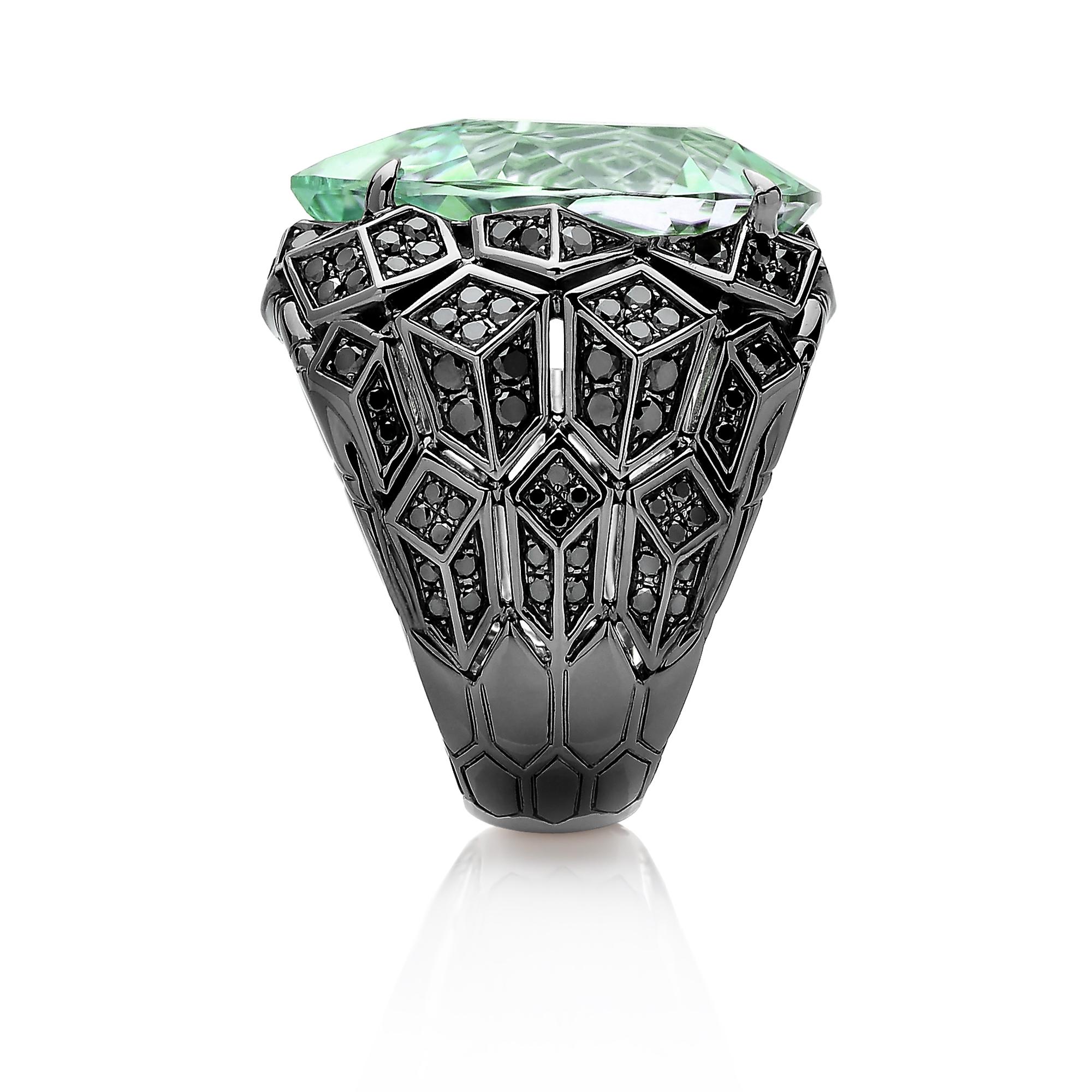 One of a kind 'Cat Woman' ring with an exquisite pear-shape mint tourmaline and black diamonds set in 18 karat black rhodium plated white gold. 

The beauty is in the details - from the combination of hues, the cut of the gemstones, and the color of