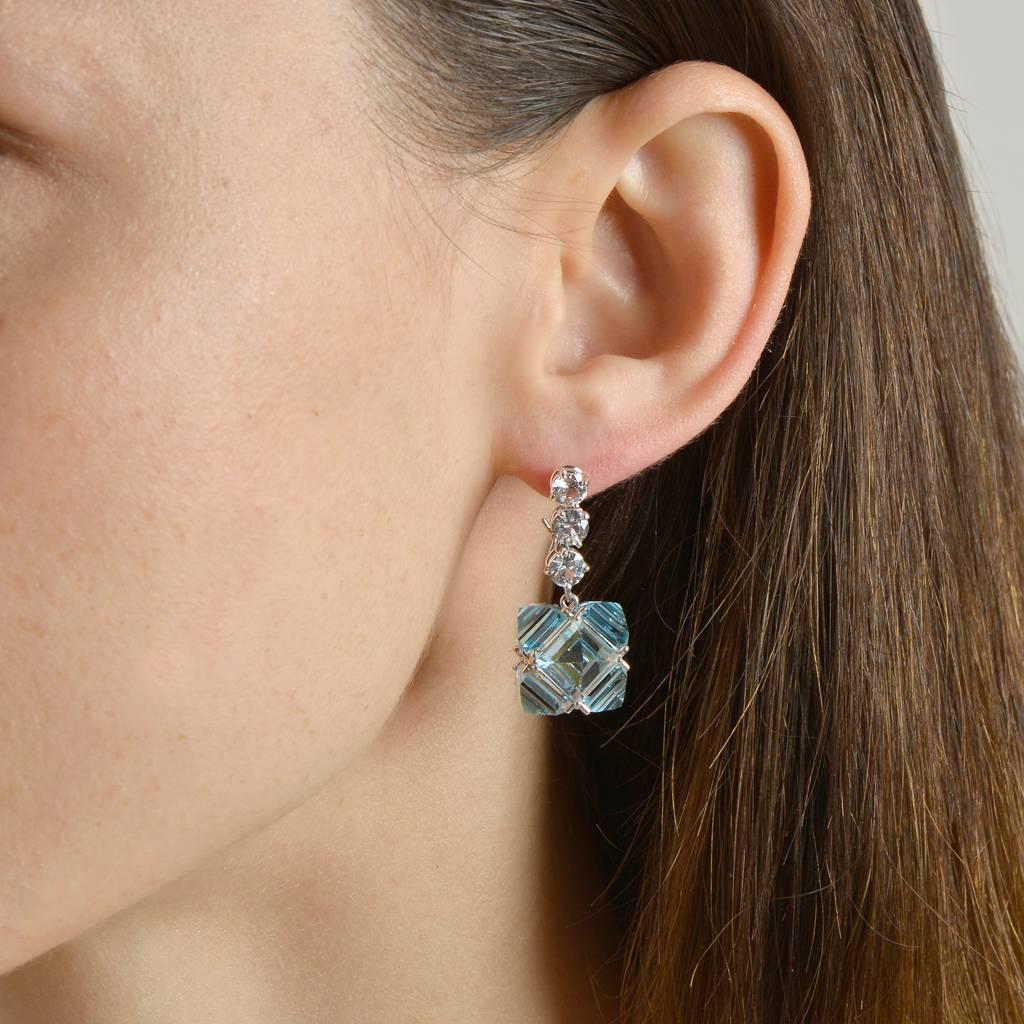 18kt white gold Very PC® earrings with reverse set emerald-cut, sky blue topaz 38.00 carats and diamond cut white sapphires 2.00 carats.

Staying true to Paolo Costagli’s appreciation for modern and clean geometries, the Very PC® collection embodies