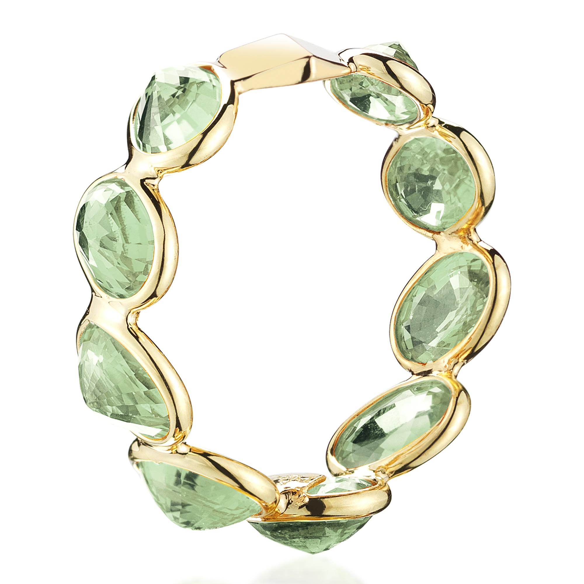 The 18kt yellow gold Ombré band set with multishade oval green sapphires at 11 o'clock® with signature Brillante® motif.

Fresh green oval sapphires come together on a band of 18kt gold forming an exquisite ring. Reminiscent of the Mediterranean Sea