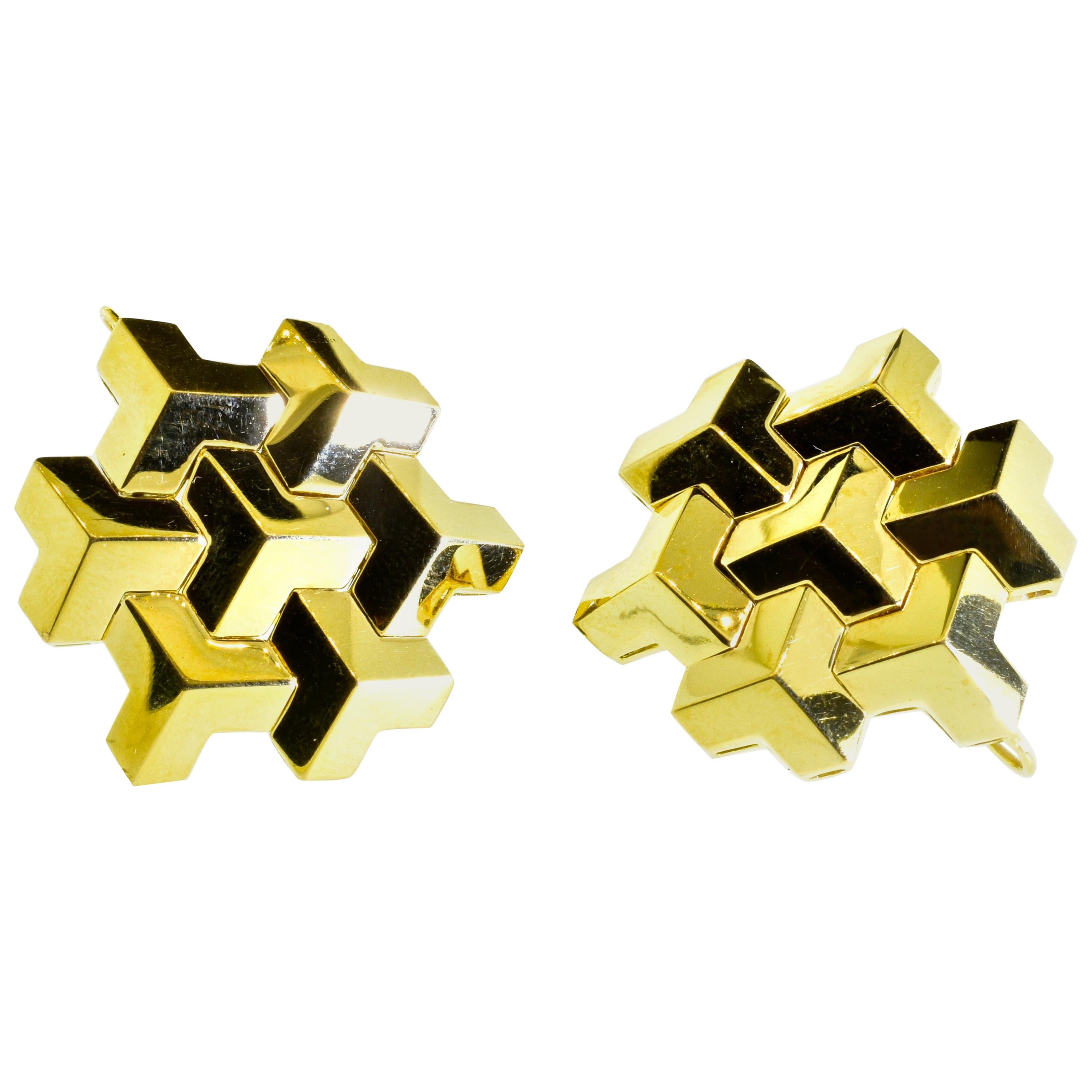 18K contemporary earrings from the famous designer Paolo Costagli. These earrings are the largest size made, they've  also have a hook at the bottom so that one can wear a pendant element  making the earrings more dramatic for nighttime.  The