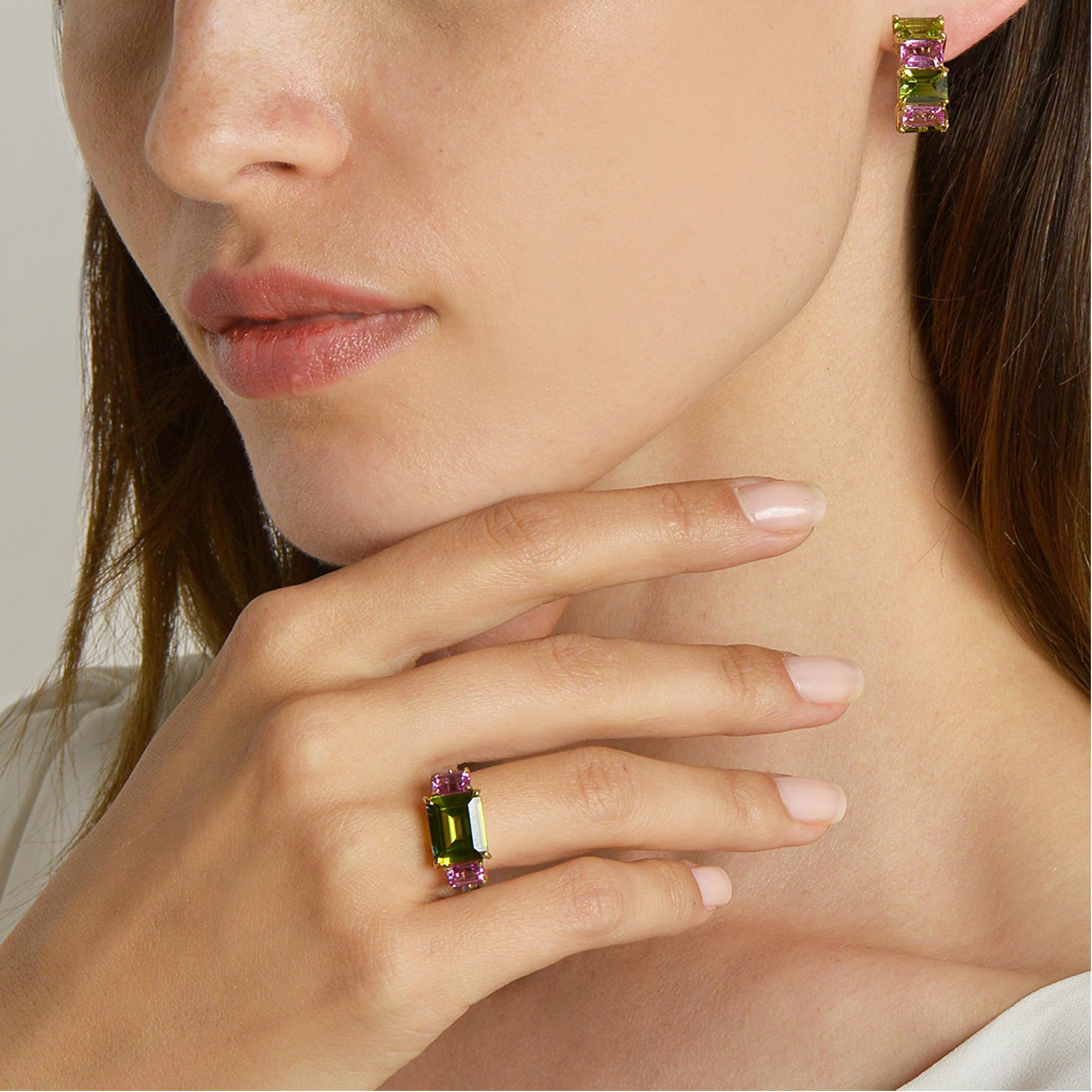 18 karat yellow gold Florentine earrings set with emerald-cut peridots and pink sapphires. 

Inspired by the Garden of Iris, the Florentine collection pairs bold color combinations of geometric gemstones to translate Paolo Costagli's memories of