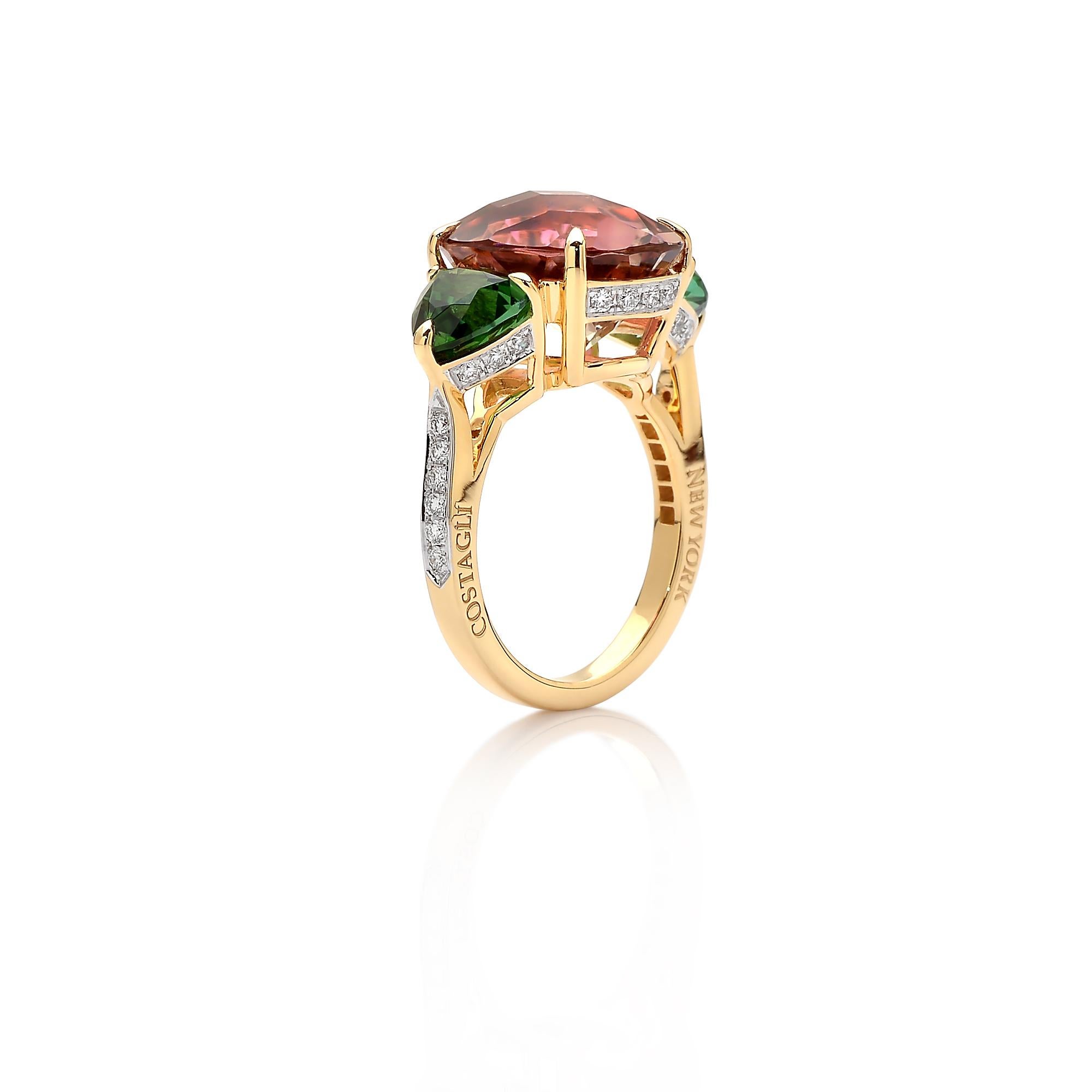 One-of-a-kind oval-cut watermelon tourmaline ring flanked by trillion-cut mint tourmaline side stones set in 18 karat yellow gold and pave-set round, brilliant diamond detailing. 

The beauty is in the details- from the combination of hues, the cut