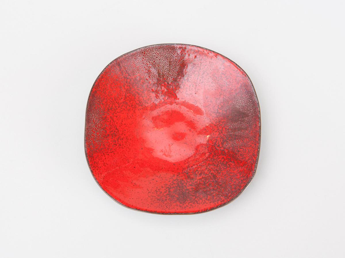 Small red enameled copper dish, designed by Paolo De Poli. Signed on the bottom.