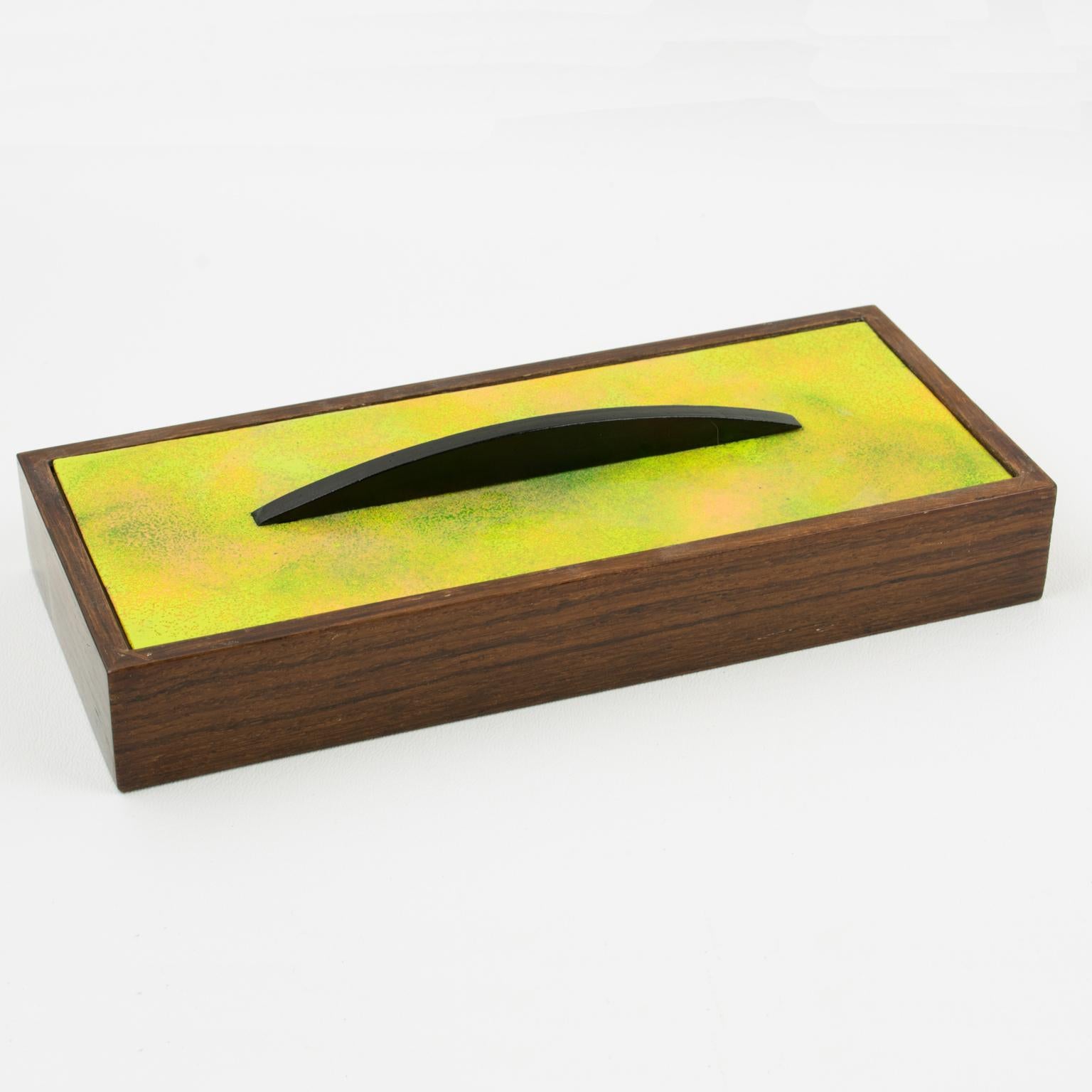 Paolo De Poli, Italy, designed this beautiful 1950s decorative lidded box. This design is commonly attributed to Gio Ponti. The flat rectangular shape with a wood base has an enamel-on-copper lid and black wood finial. The stunning apple green