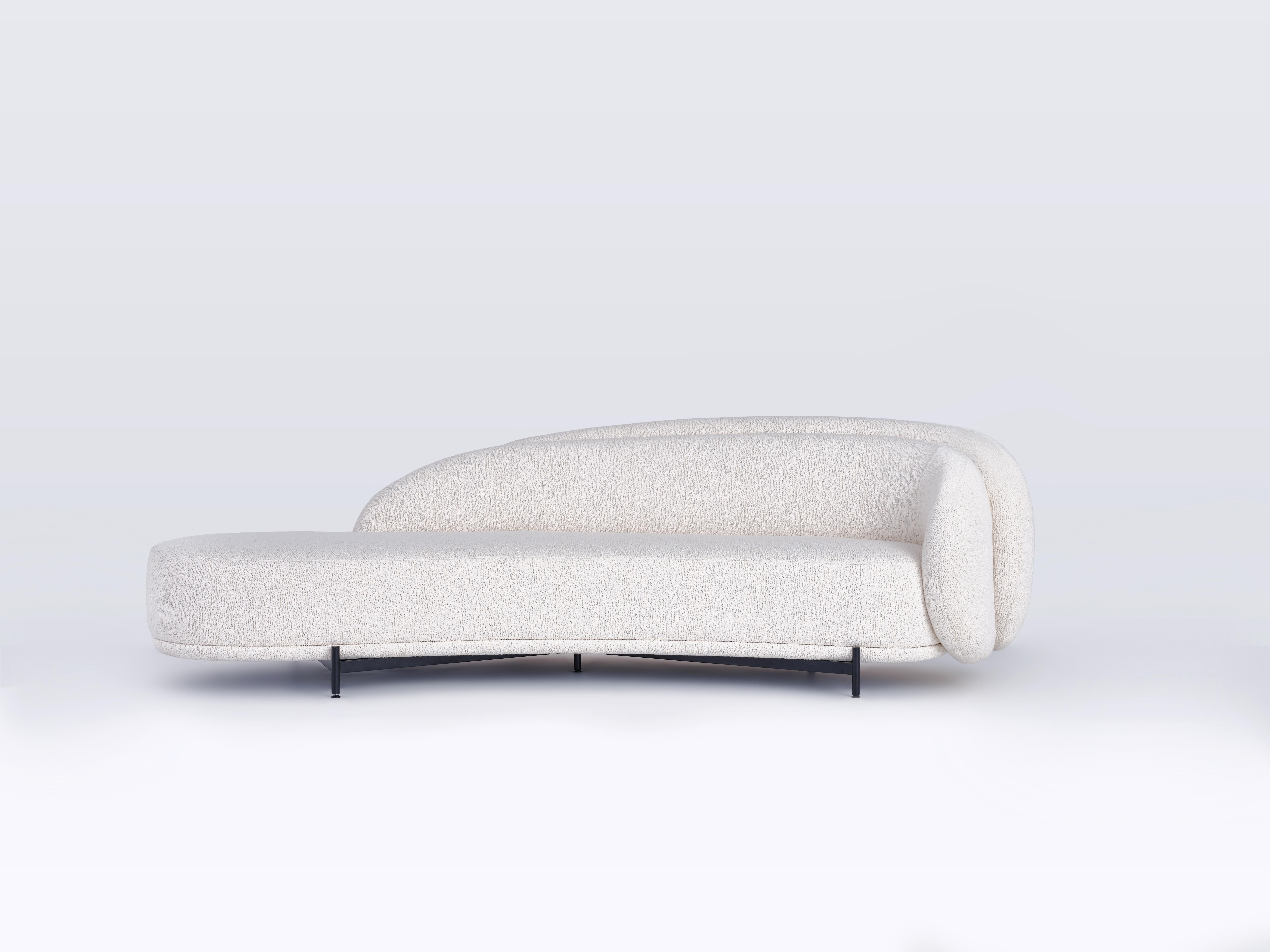 Please note the images in this listing show the Layered Back Sofa with Pierre Frey Esteban Upholstery which is not included in the list price. Please consult our Sales Team for additional information.

PRICING + COM
This Paolo Ferrari design is