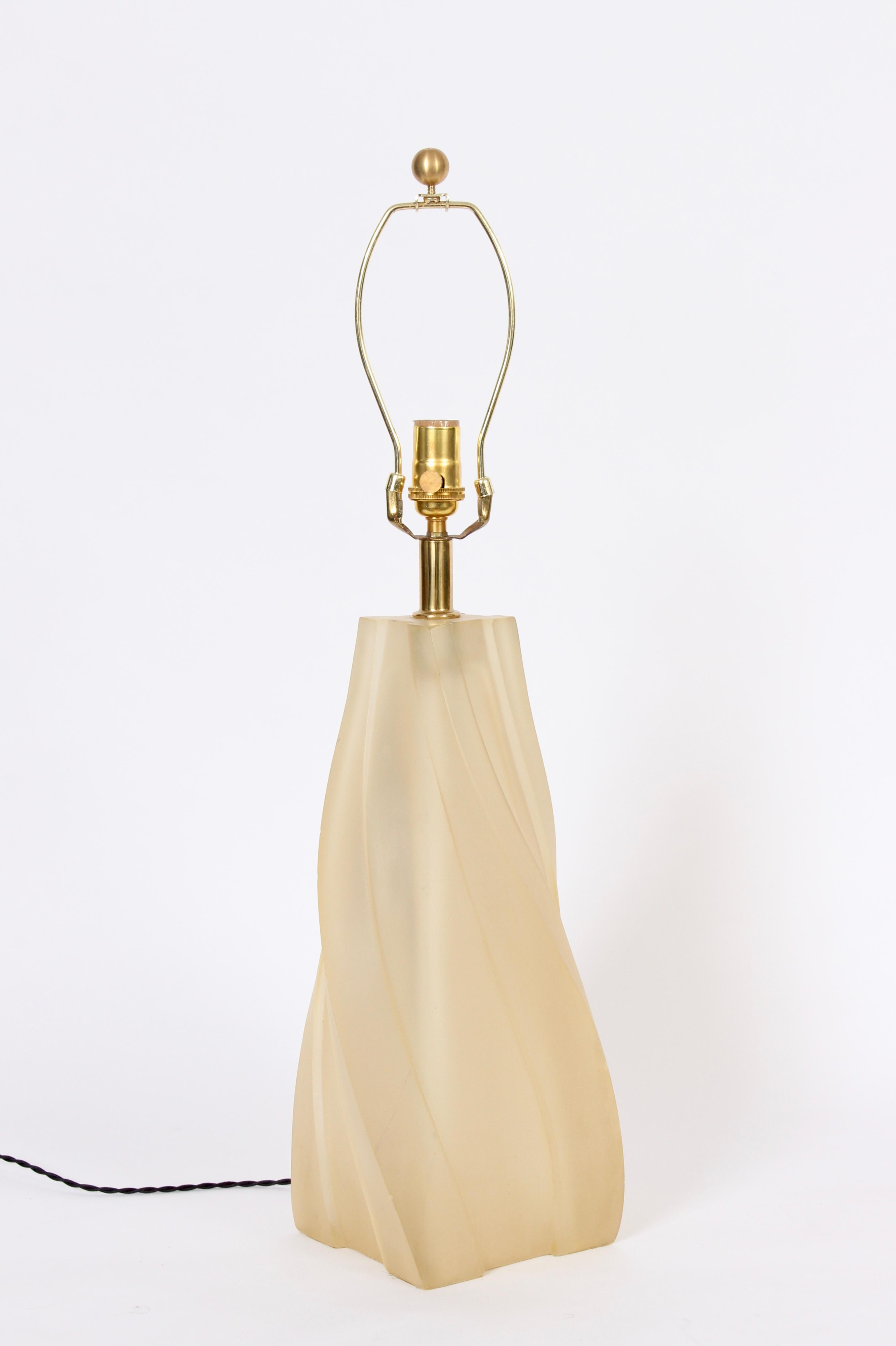 Hollywood Regency Paolo Gucci translucent lucite table lamp, circa 1970.  Featuring a smooth sculpted twist form in warm off-white resin. With subtle glow when illuminated. Shade for display only (10 H x 14 D top x 18 D bottom). 22 H to top of