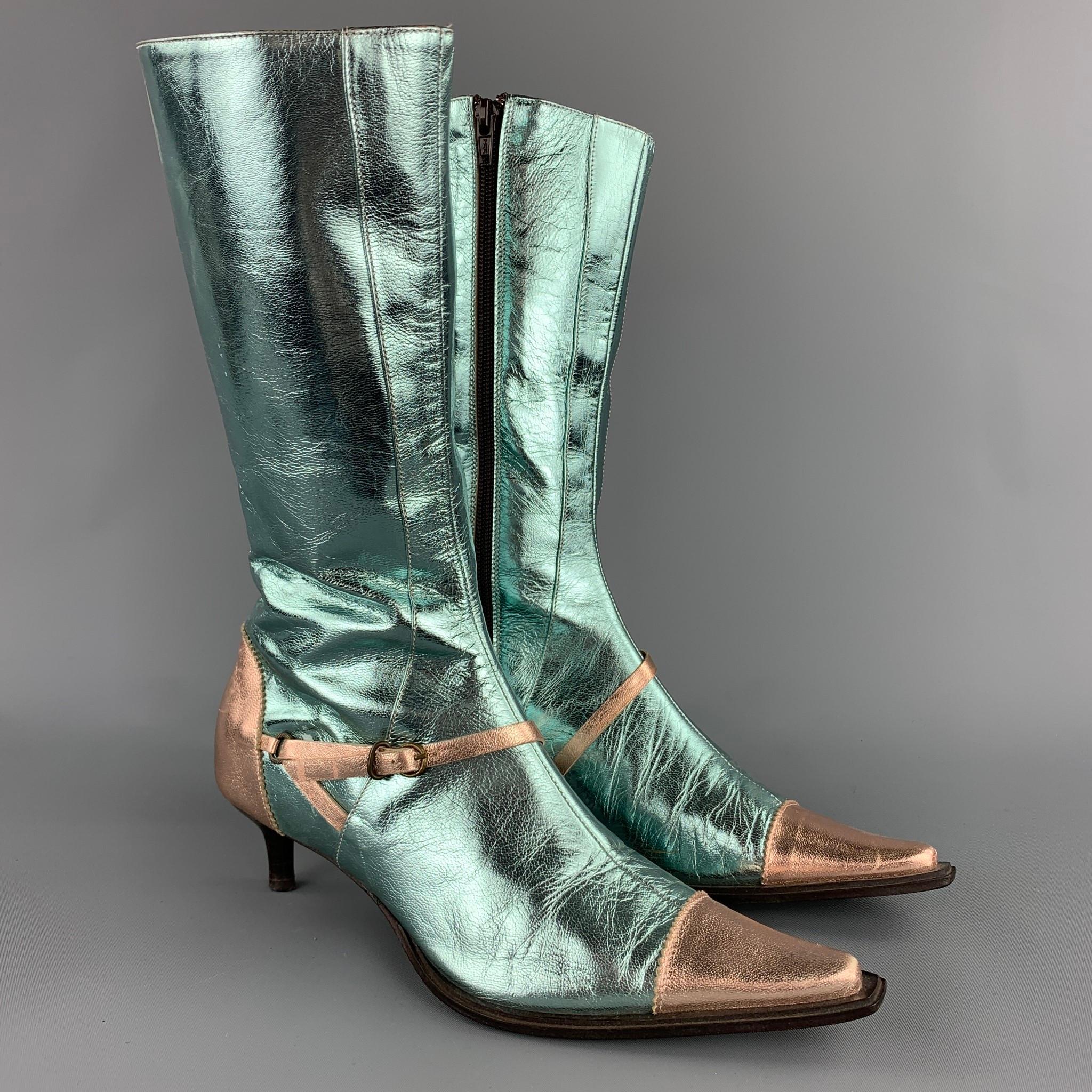 PAOLO IANTORNO boots comes in a aqua & rose gold metallic patent leather featuring a pointed toe, mid-calf, kitten heel, and a side zip up closure. Made in Italy.

Good Pre-Owned Condition.
Marked: EU 36.5

Measurements:

Length: 10 in.
Height: 11