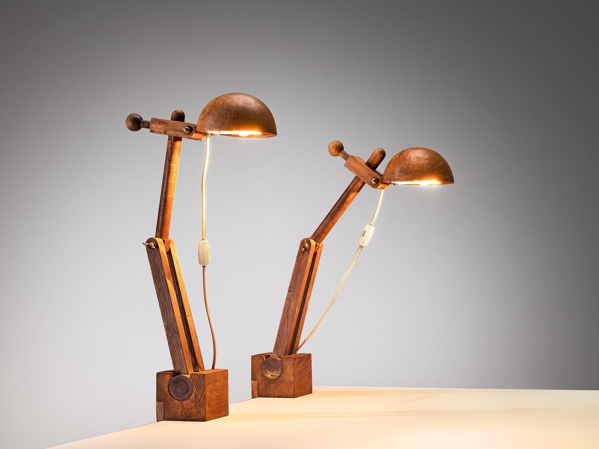 Paolo Pallucco for Pallucco Roma, desk lamps, chestnut, Italy, 1960s

A distinctive clamp desk lamp, thoughtfully designed by Paolo Pallucco, not only offers functionality but also visual appeal. Crafted from solid chestnut, it features a