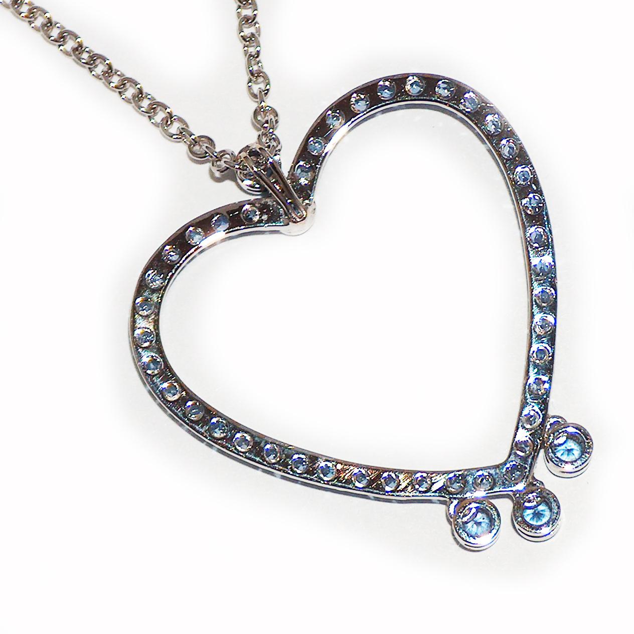 Pendant with Chain in 18kt white gold which sets Light Blue Sapphires for ct. 1,80. 
Lenght of the chain: 31 cm

Unique piece, designed and handcrafted in Italy, by visionary goldsmith Paolo Piovan. 

Paolo Piovan Jewels, creations of the purest