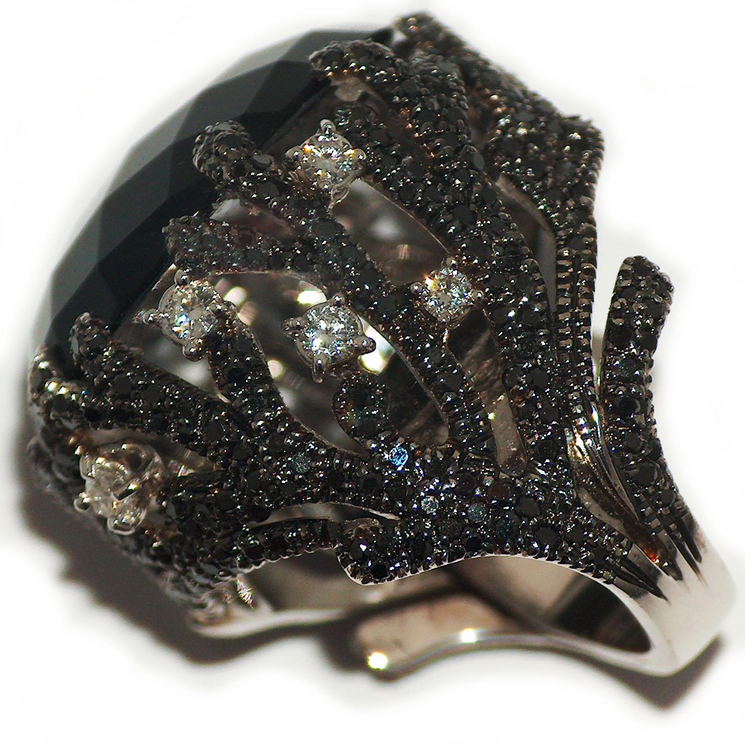 Ring in 18kt white gold which sets White Diamonds for ct. 0,74, Black Diamonds for ct. 3,10 and Onyx for ct. 19,00

Unique piece, designed and handcrafted in Italy, by visionary goldsmith Paolo Piovan. 

Quintessentially chic, this black and white