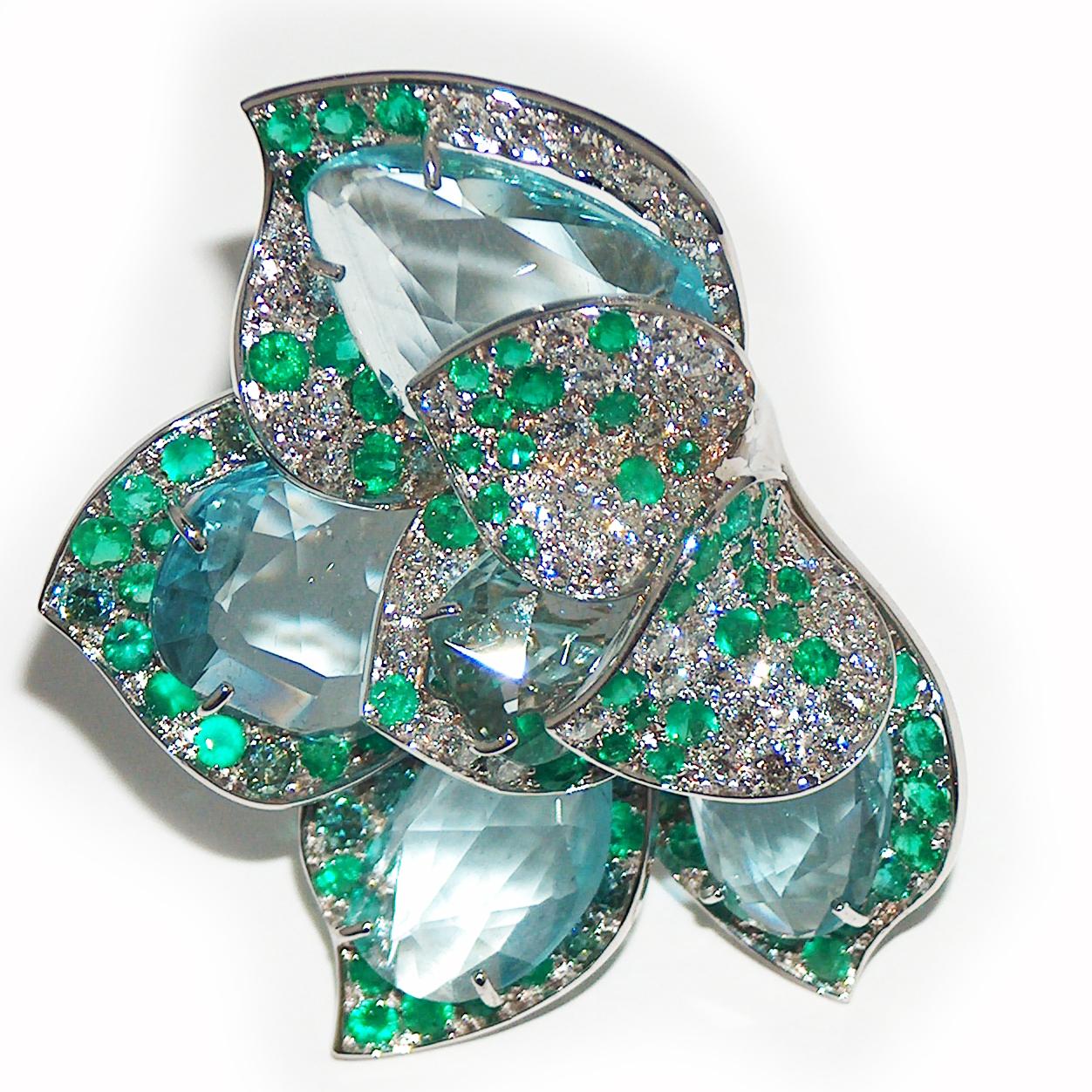 Ring in 18kt white gold which sets White Diamonds for ct. 2,98, Emeralds for ct. 3,88 and Aquamarine for ct. 25,37.

Unique piece, designed and handcrafted in Italy, by visionary goldsmith Paolo Piovan. 

This extra-ordinary ring has become a