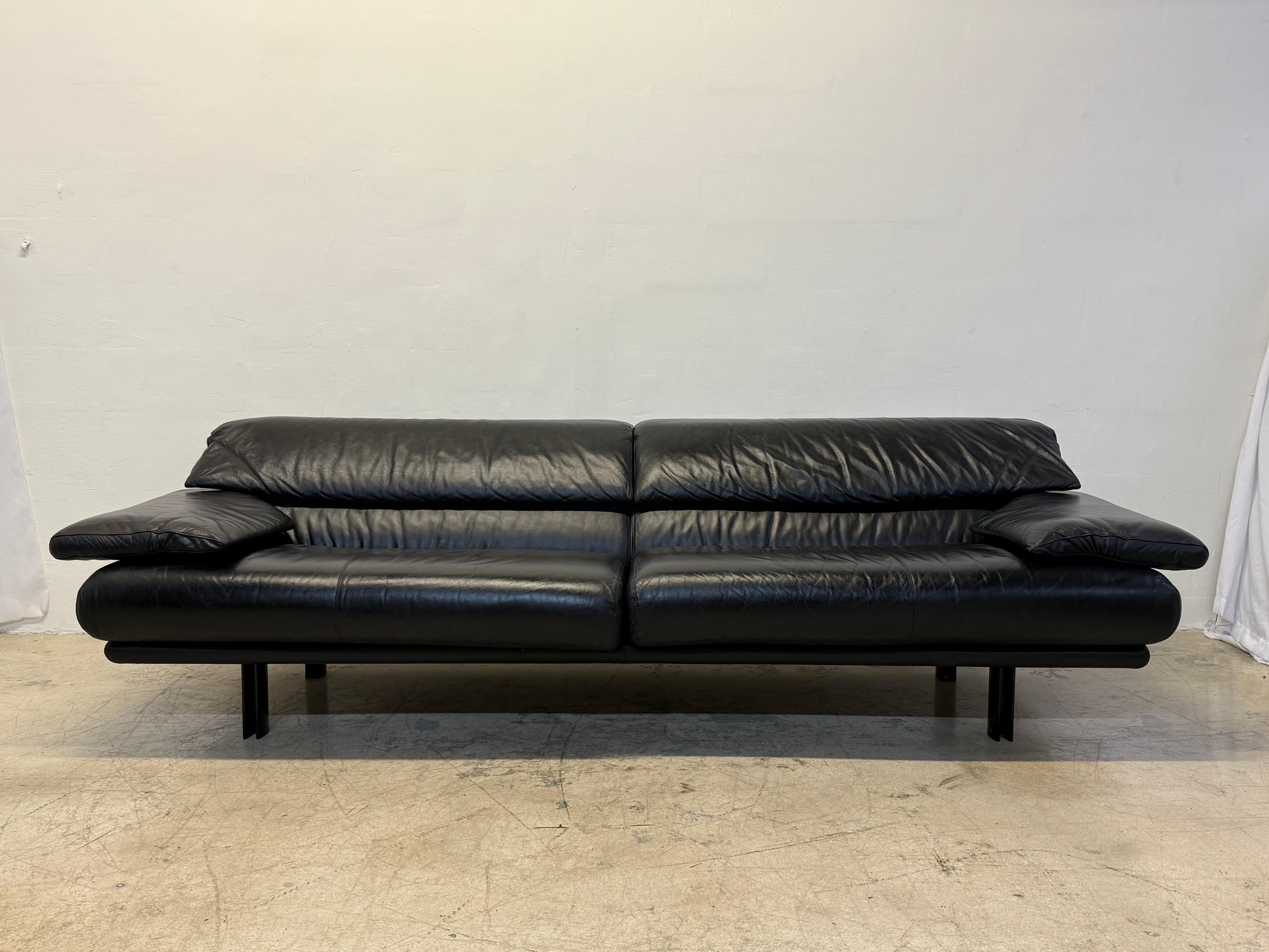 Black leather Alanda sofa with adjustable backrests and armrests designed by Paolo Piva for B&B Italia, 1980s.  This larger version sofa with width of 102” comfortably seats 3-4 people and the adjustable backrests make for a perfect support for