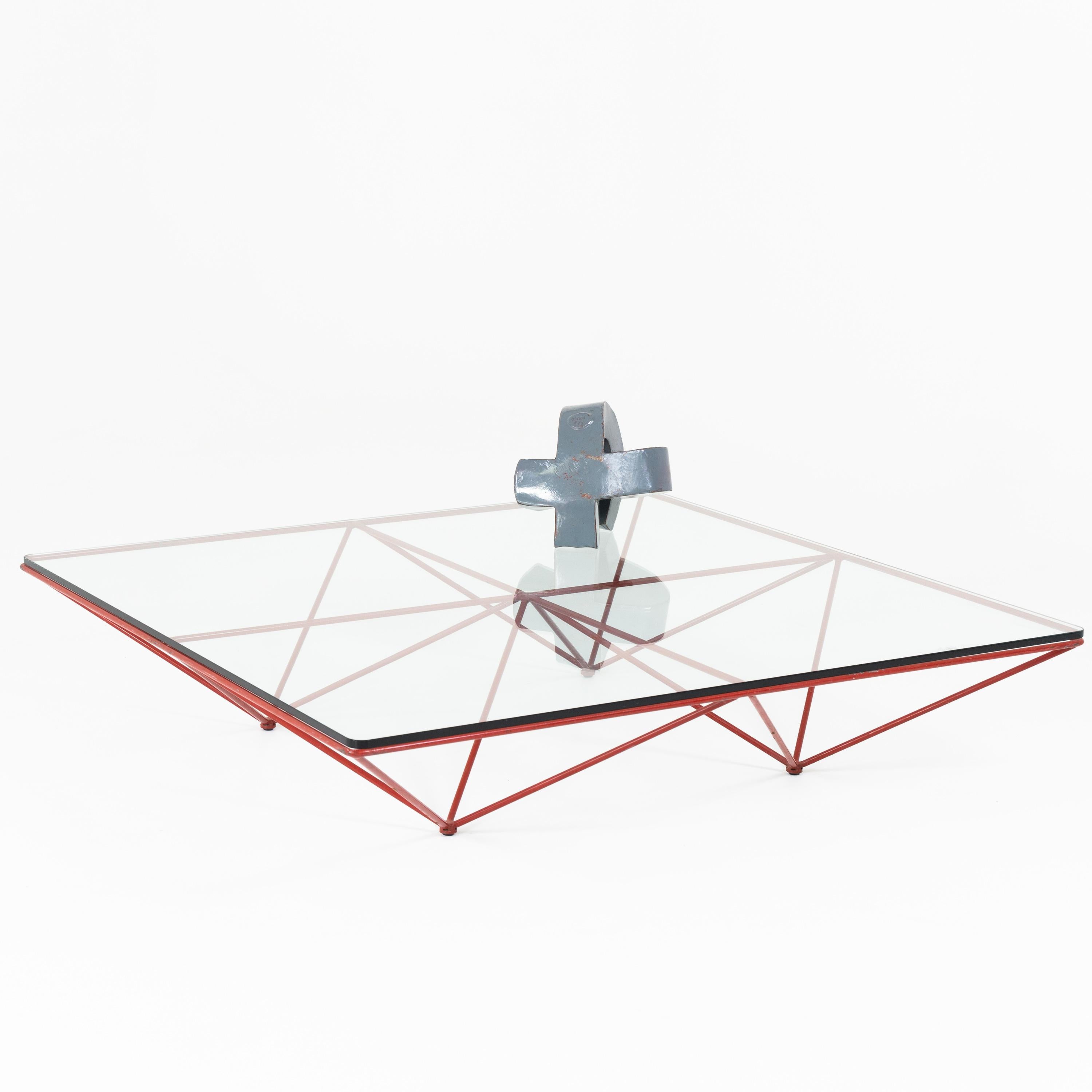 Square coffee table on red iron frame with glass top by Paolo Piva. Signs of age and use.
 
