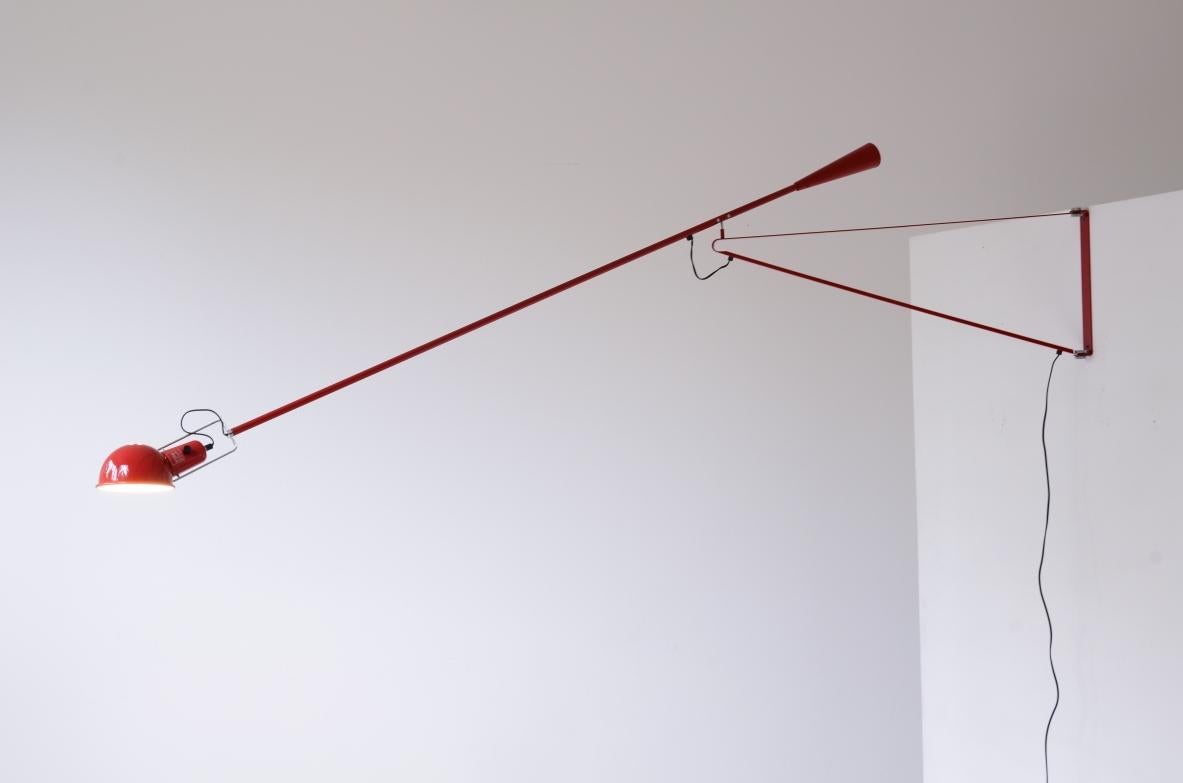 COD-2826
Paolo Rizzatto

Lamp adjustable in all directions with shade and articulated arm in painted steel and cast iron counterweight.

Production Arteluce, 1968.
