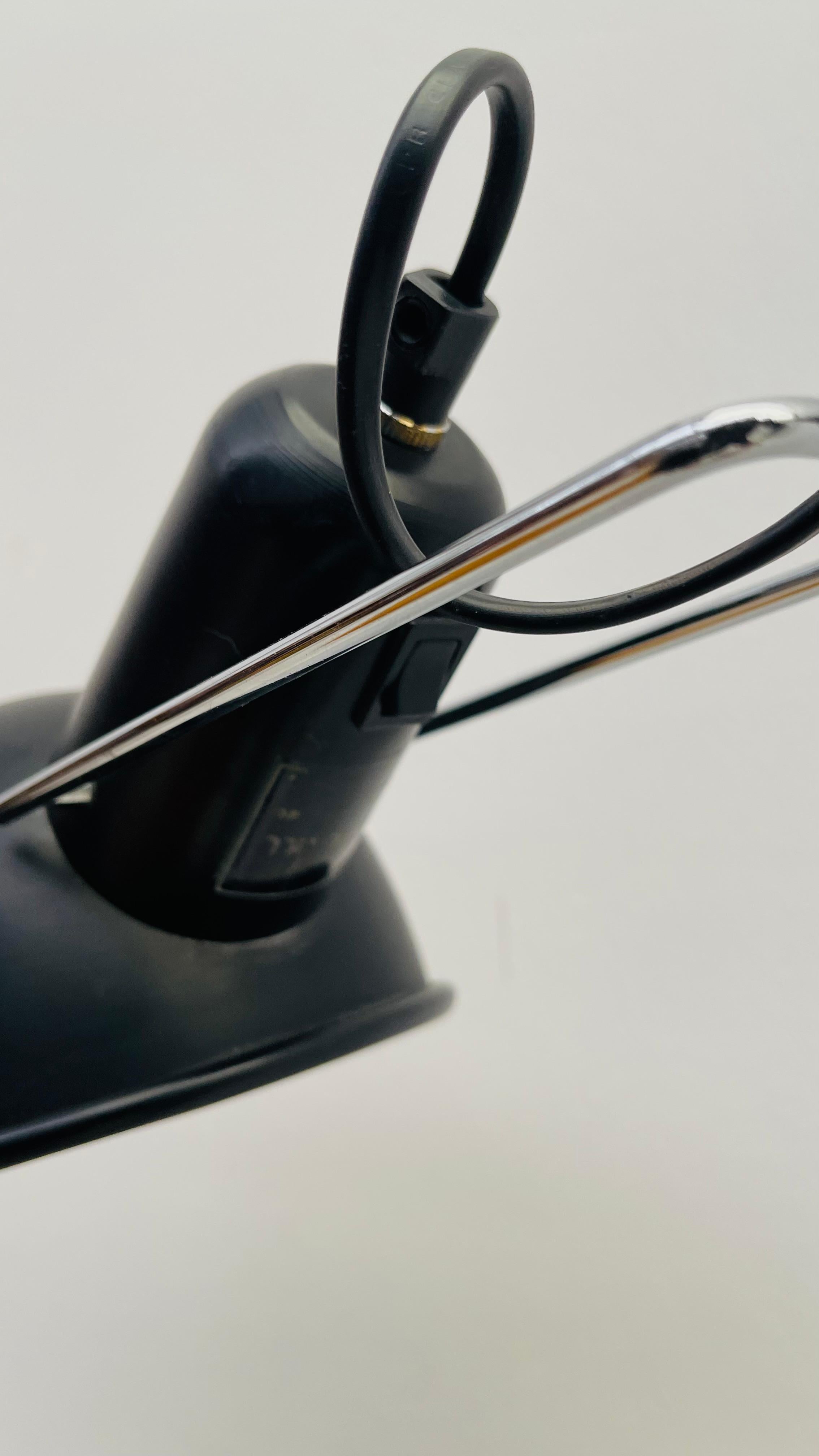 The Model 265 by Paolo Rizzatto is made out of laquered steel. 

This wall lamp seems to defy gravity thanks to its elegant counterweight.

This original italian lamp from the 70's is as practical as elegant.
Featuring a 360° range of moving and is