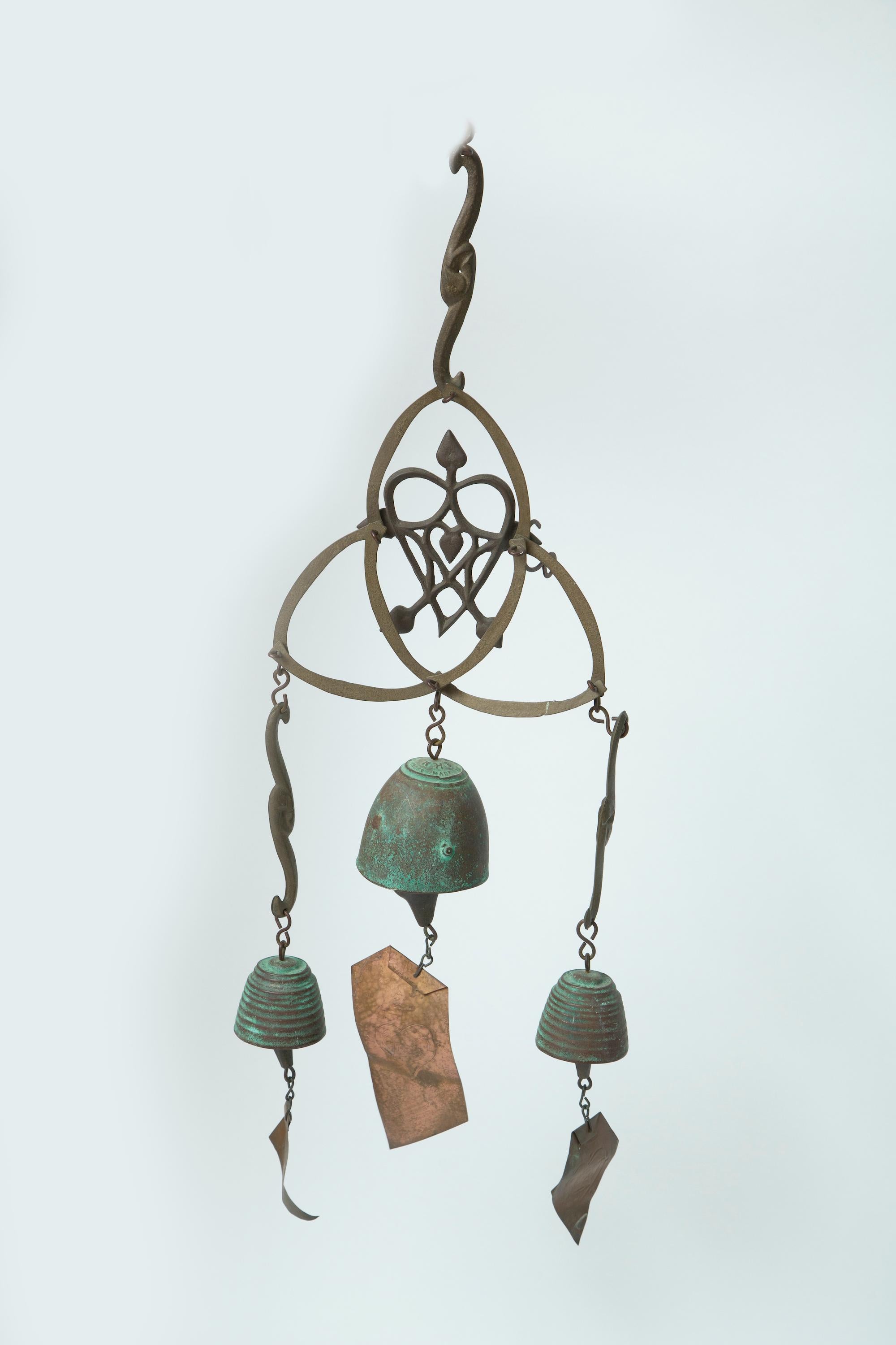 A hanging triple bell configuration.
An older example with great patina.