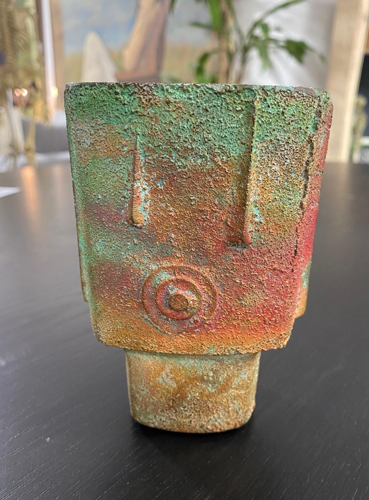 A wonderful and rare, hard-to-find bronze vase by famed Italian architect/designer/artist Paolo Soleri.

Paolo Soleri, who studied with Frank Lloyd Wright at Taliesin West, founded Cosanti and Arcosanti in the Arizona desert near Scottsdale.