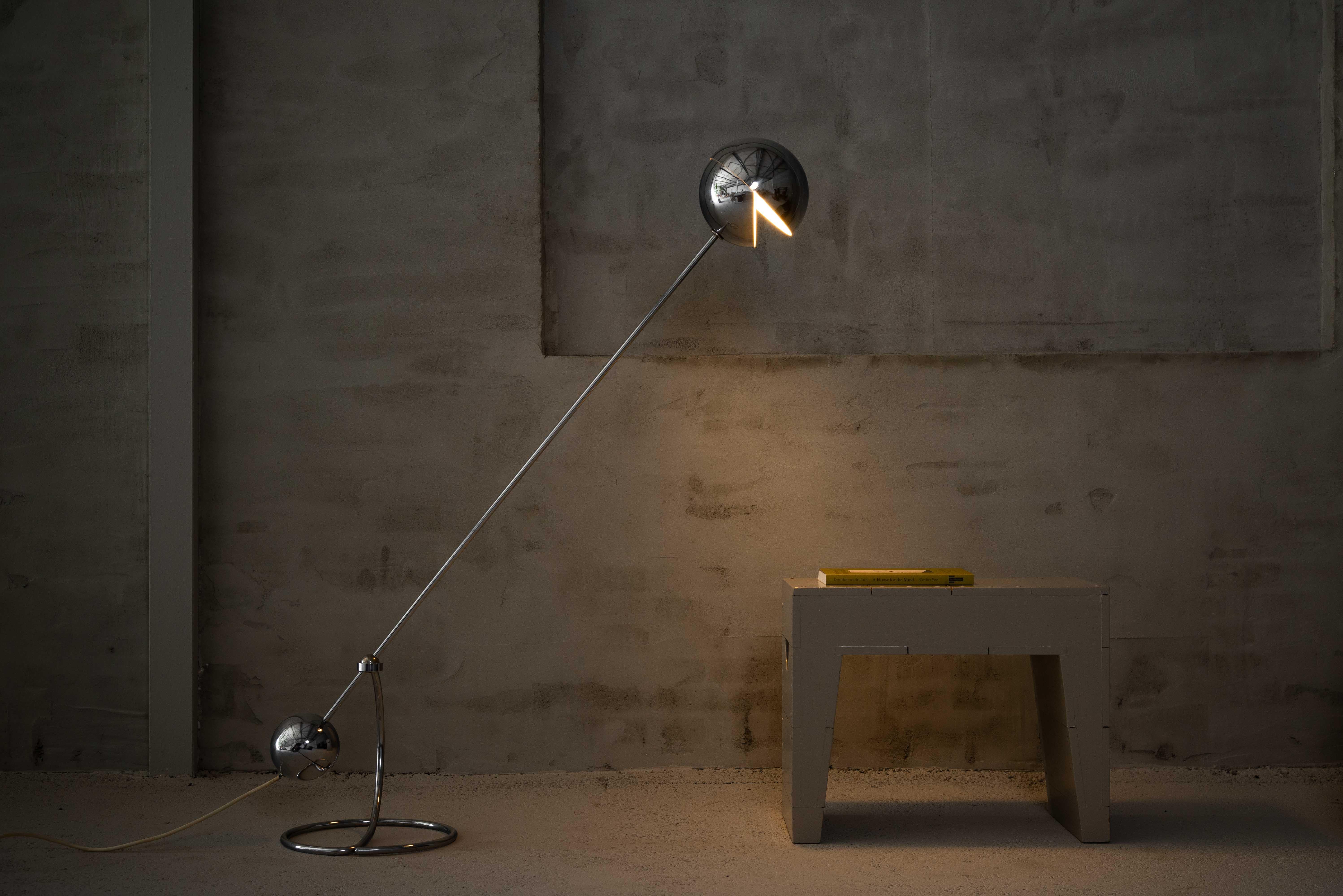 Introducing the Iconic adjustable floor lamp model S3 by Paolo Tilche for Sirrah, Italy 1972. This amazing floor lamp combines elegance and practicality in a sleek and simple design. The S3 floor lamp has a round counterweight that ensures perfect