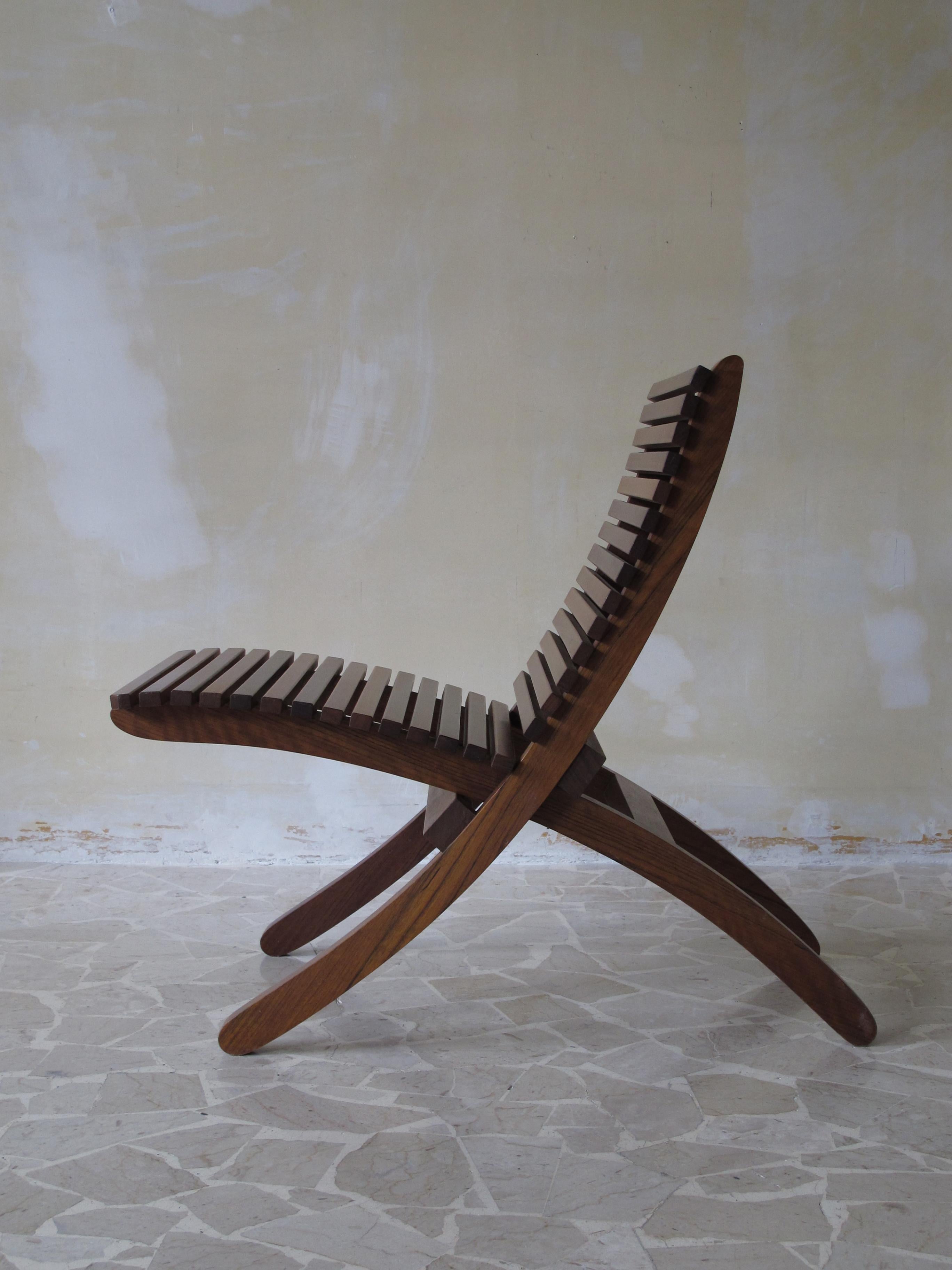 Italian chair or armchair in solid wood designed by Paolo Tilche,
the chair consists of two separable pieces, the chair is perfect for inside and outside, circa 1960s.