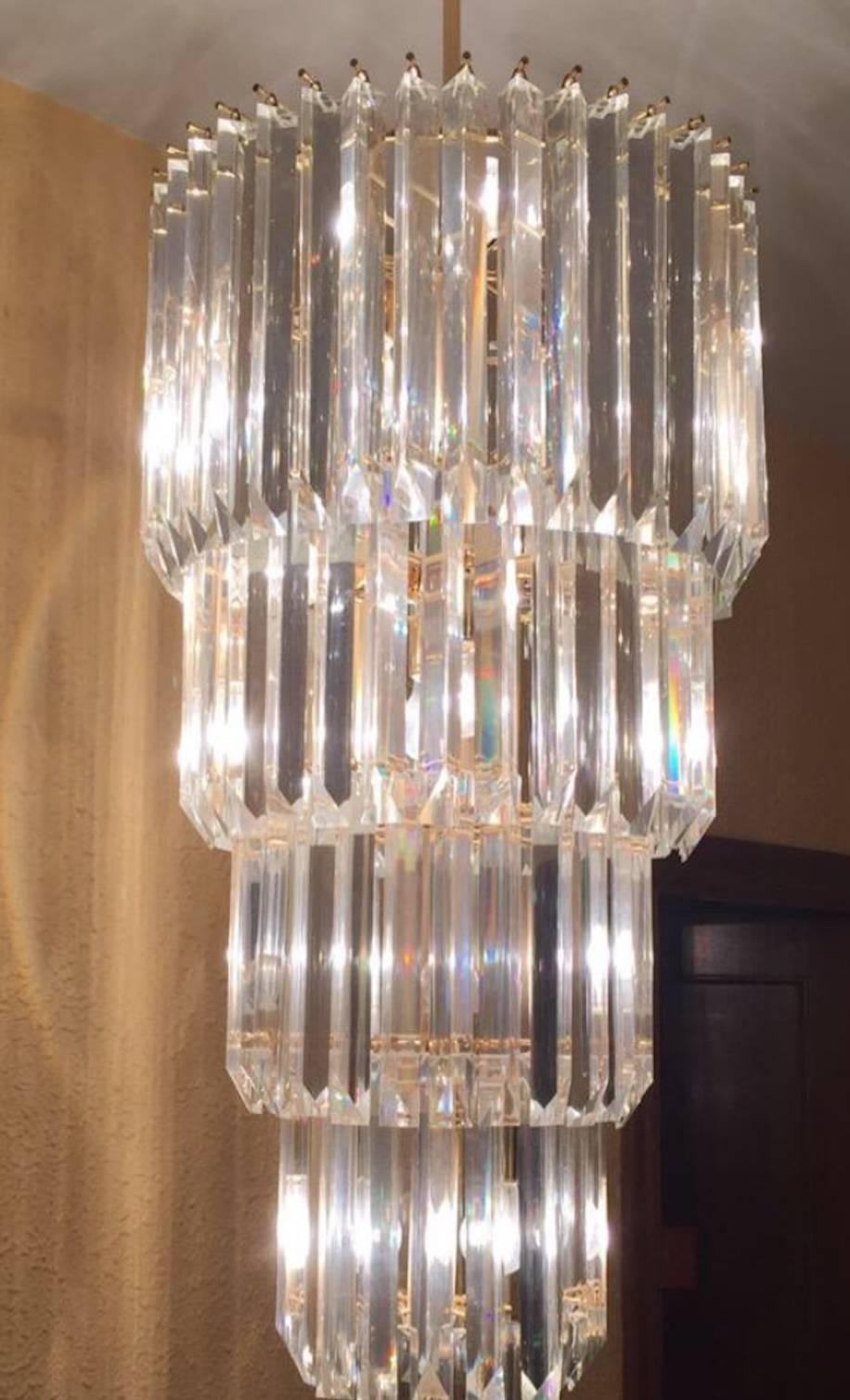 Tiers of Italian Murano triangle glass crystals Cascade in a downward in this stunning chandelier by revered manufacturer, Venini. Fixture has 12 candelabra sockets and is wired and ready to install.
A real stunning ORIGINAL vintage period lamp !!