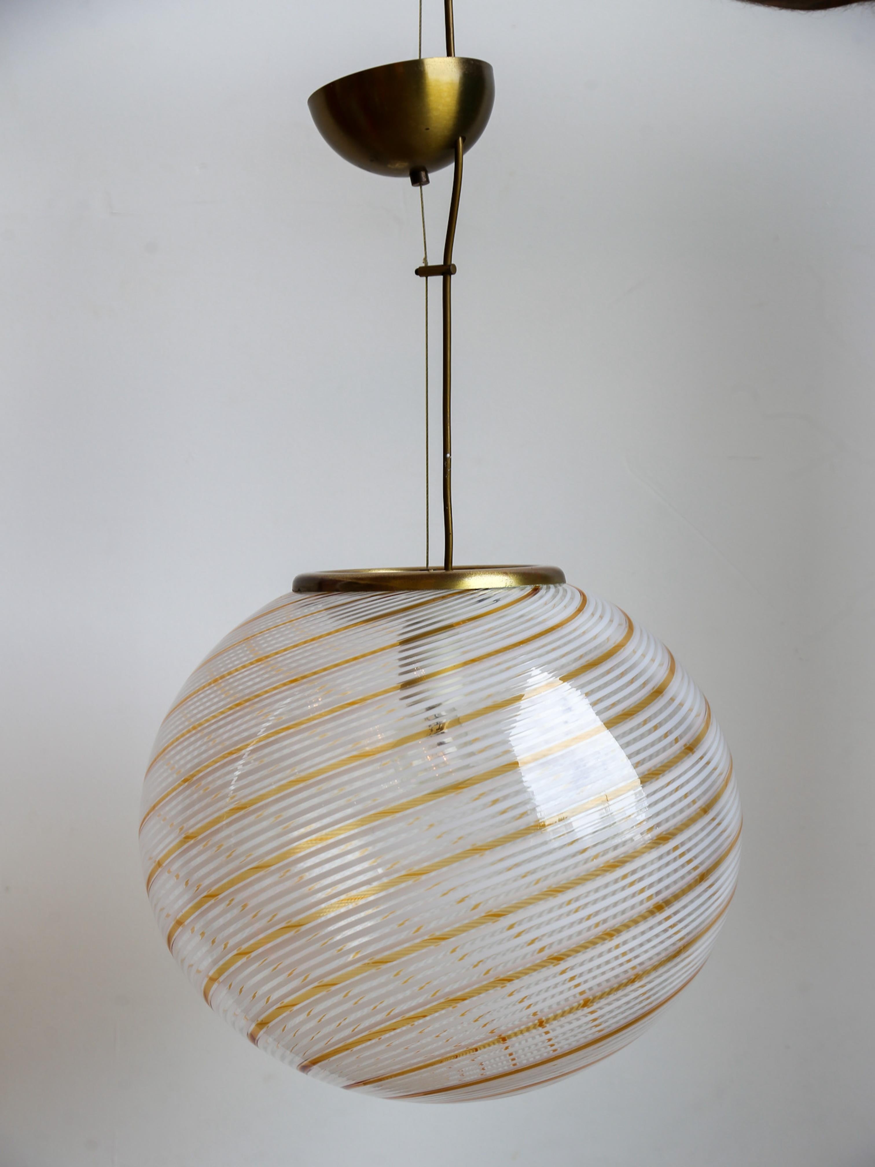 Italian Paolo Venini Spherical Murano Glass and Brass Pendant Light For Sale
