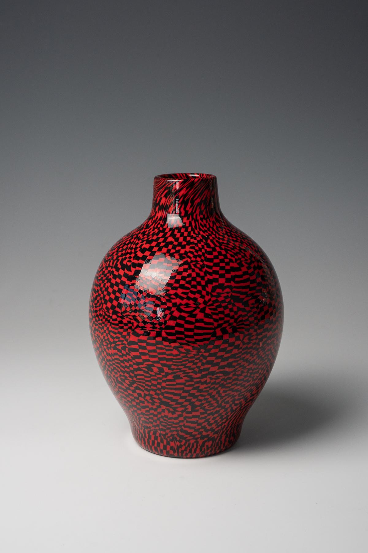 Paolo Venini (1895-1959), a rare vase from 'Dama' series, ca. 1950
hand-blown glass murrine
signed with three-line acid stamp 'venini murano ITALIA'

Excellent condition

LITERATURE:
Different examples from the series and illustration of technique