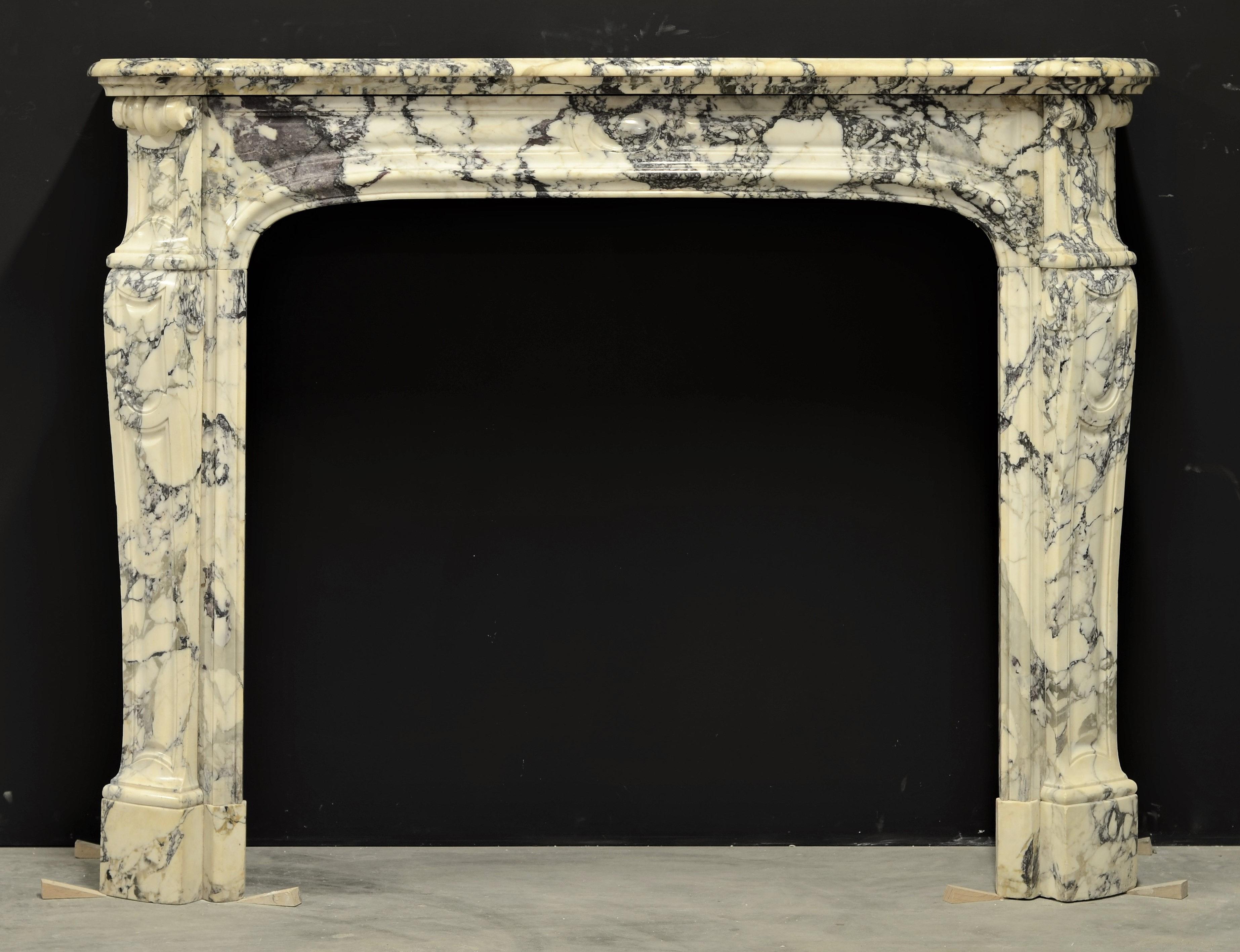 Paonazetto Pompadour Fireplace Mantel
Superb French Pompadour style Louis XV fireplace mantel executed in beautiful Paonazetto breche marble.
The soft toned marble combined with the hard veins makes this a true jaw-dropper.
Great usable